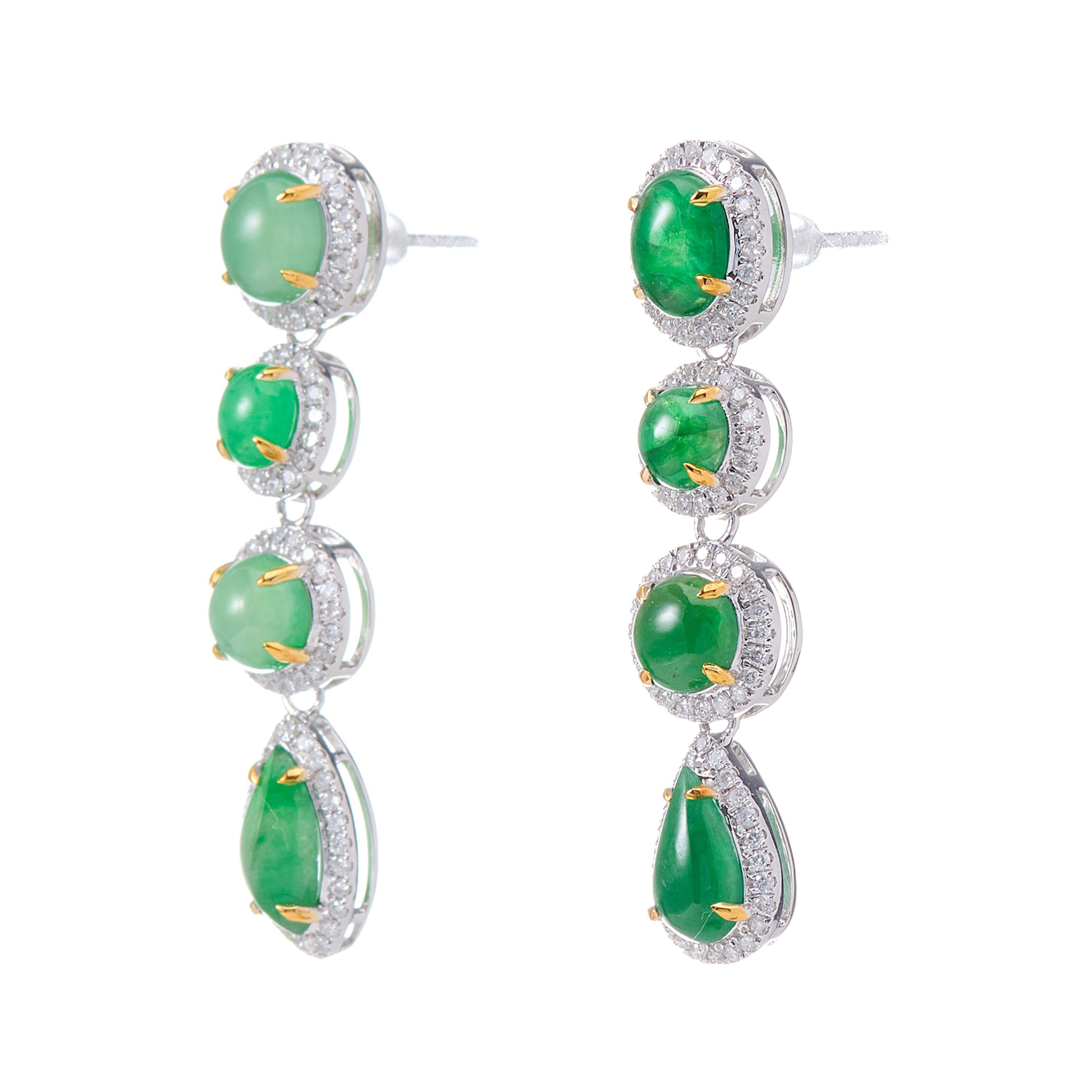 Description:
The beauty of asymmetry and individualism is capture in these Fei Liu one-of-a-kind drop earrings. Each earring features a delectable assortment of imperial jade, showcasing the array of light and dark green hues seen in natural jade.
