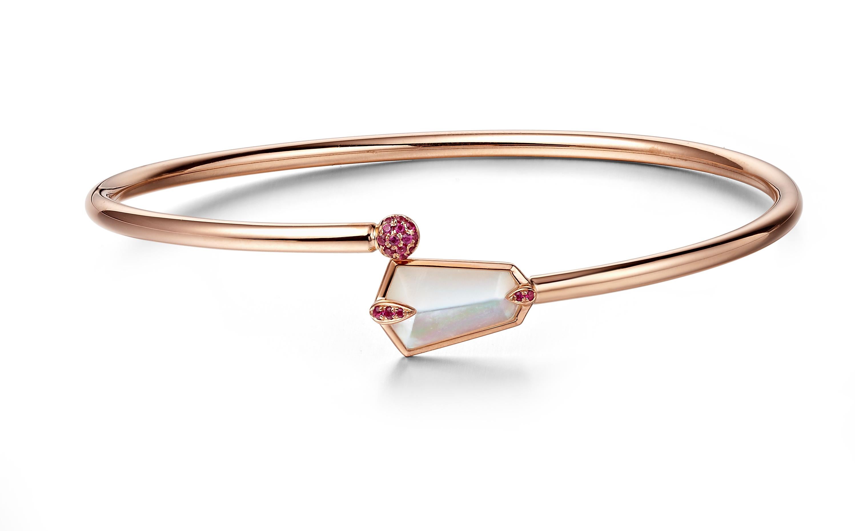 Description:
Nova kite bangle 0.083ct pink sapphires and 1ct mother of pearl, set in 18ct rose gold with a high polish.

Inspiration
The Nova Collection embodies the essence of freedom and having the courage to explore new adventures – much like the