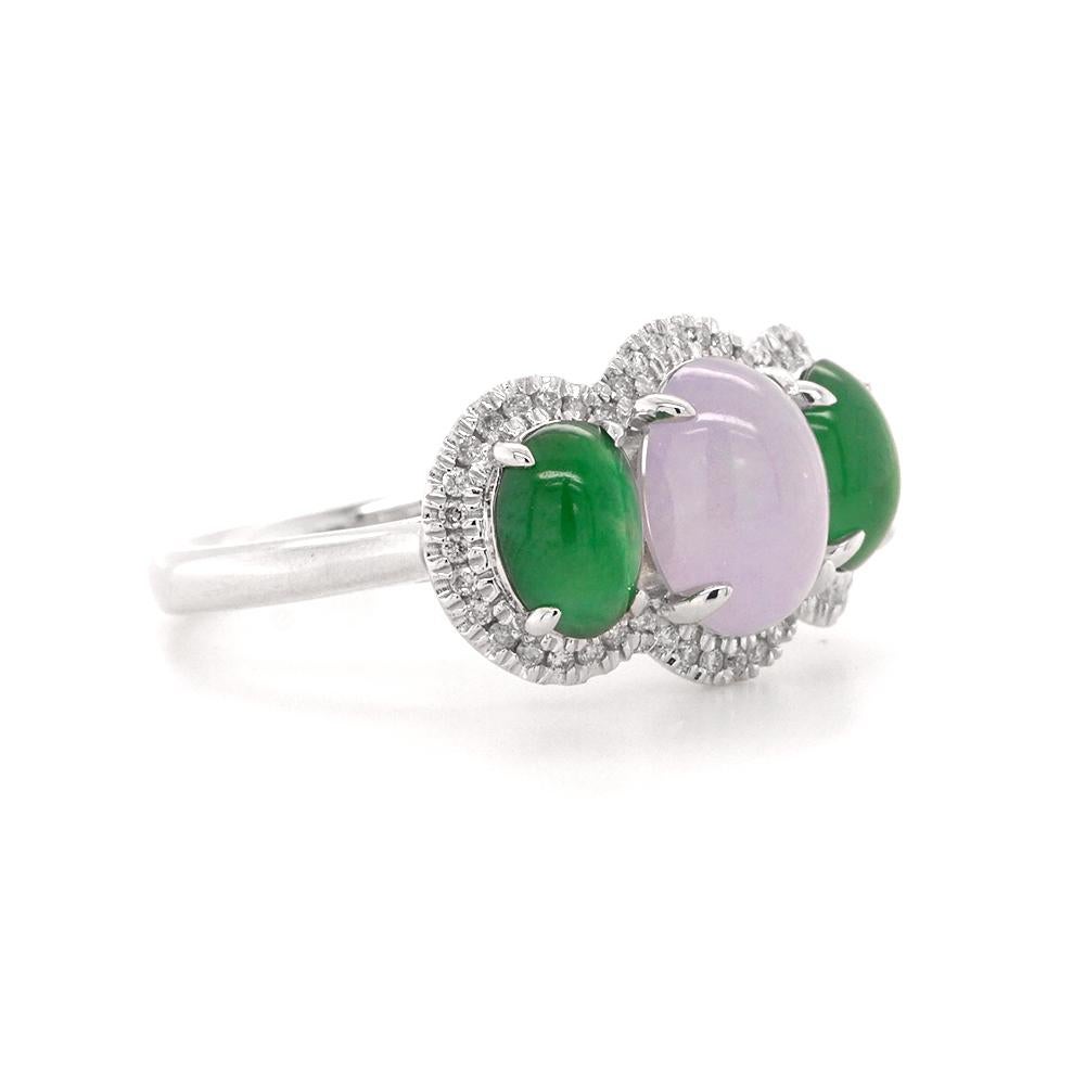 This exquisite jade trilogy ring, crafted in platinum, epitomises elegance and timeless beauty. At its centre, an exquisite lavender jade exudes soft, ethereal hues, symbolising tranquillity and grace. Flanking the central stone are two green jade