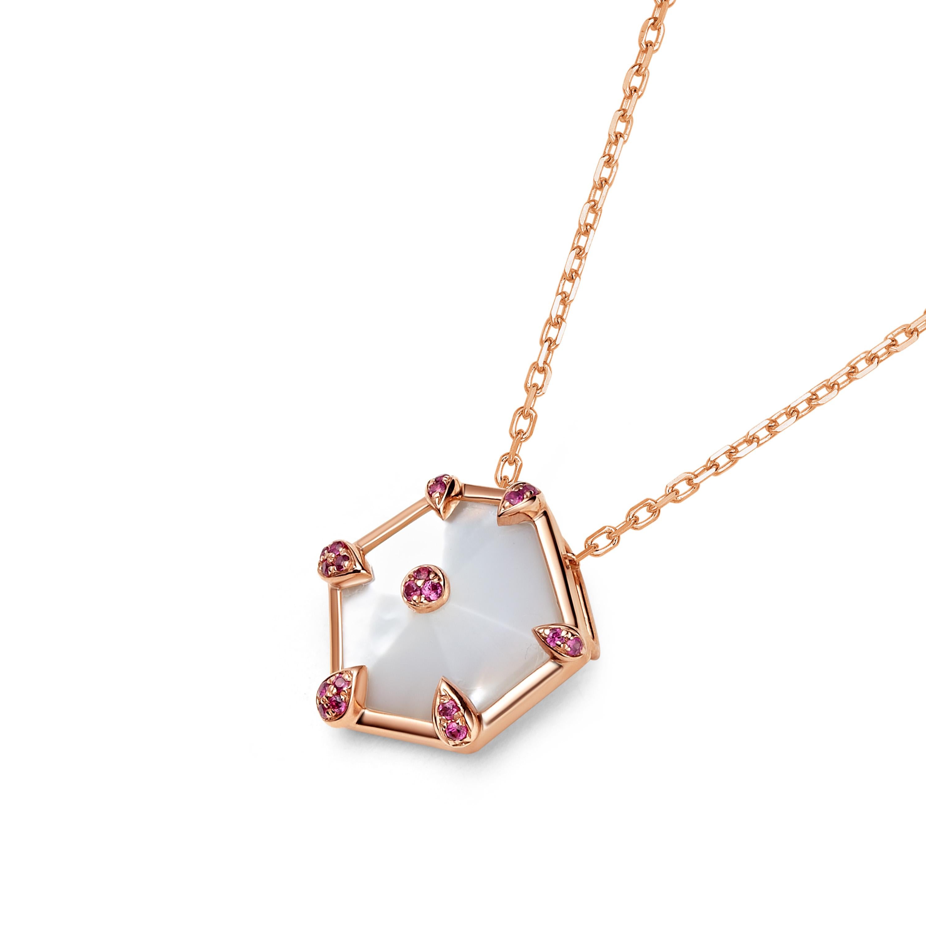Geometric yet elegant lines are epitomised across this 18ct gold collection, which follows the strong structure of a kite.  Nova small hexagon pendant 0.048ct pink sapphires and 1.5ct mother of pearl, set in 18ct rose gold with a high polish.

-