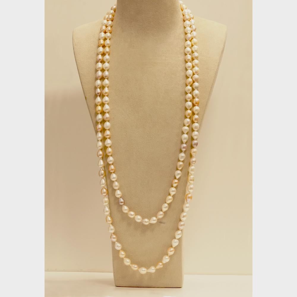 Measuring a generous 66 inches in length, this knotted necklace offers versatility like no other. Its luxurious length allows for a variety of stylish arrangements, enabling you to wrap it around your neck twice for a captivating layered effect.