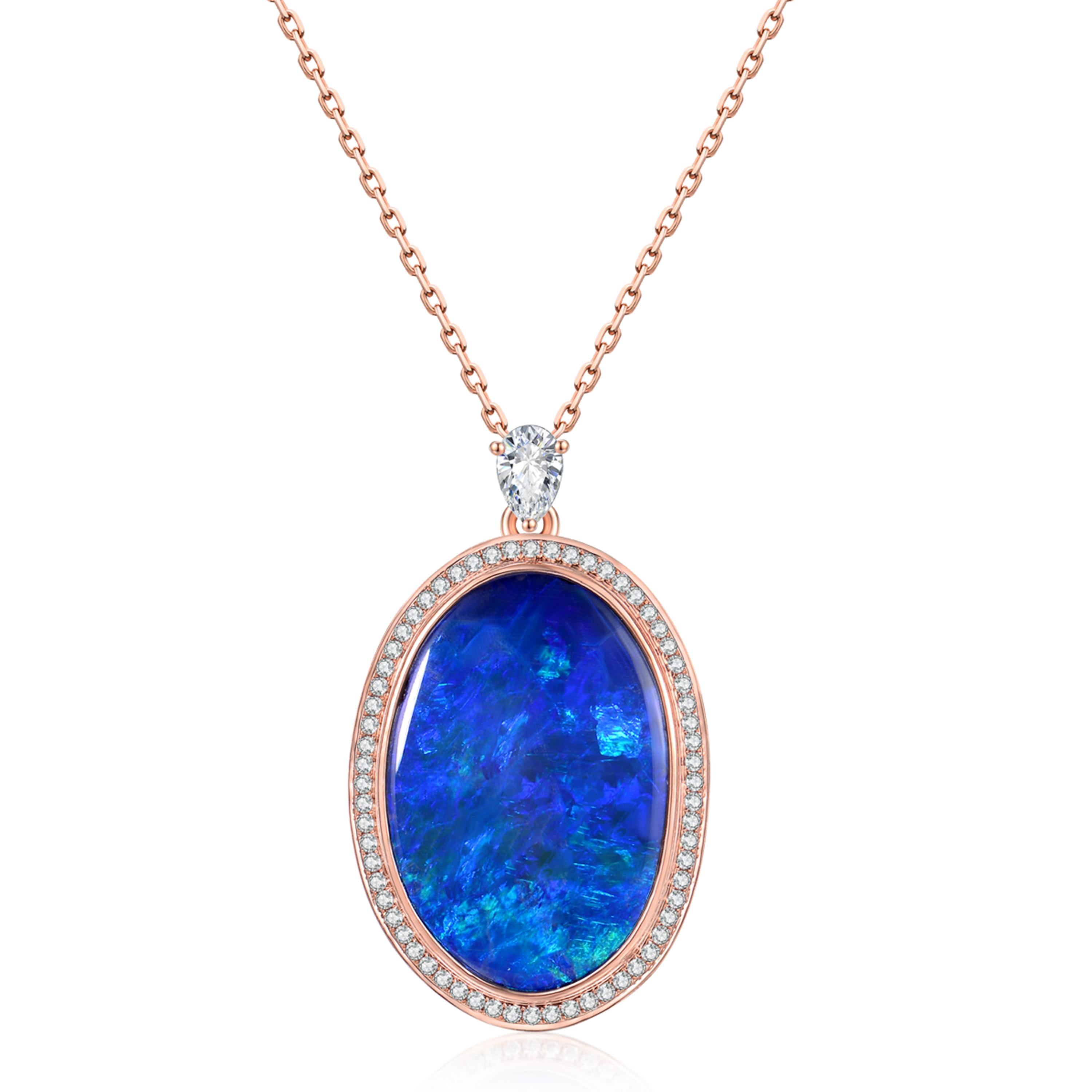 Description:
A one-of-a-kind deep blue boulder opal with a weight of 6.1ct, bordered by a halo of brilliant diamonds with a total weight of 0.32ct, set in 18ct rose gold.

Opal care: Clean opals with luke-warm soapy water.

Specification:
Size