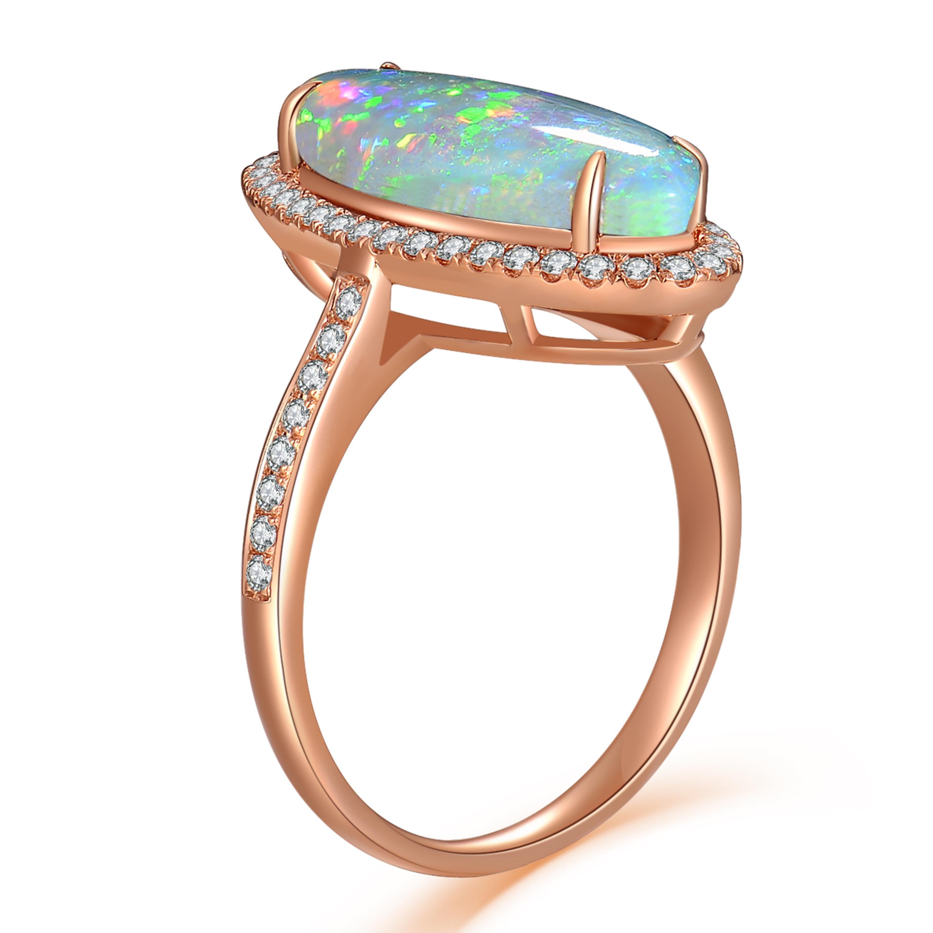 Description:
A one-off opal ring featuring a mesmerising 3.39ct opal bordered with 0.34ct brilliant diamonds, set in 18ct rose gold.

Opal care: Clean opals with lukewarm soapy water.

Specification:
Weight: 4.29gm
Ring size: N (UK) / 63/4