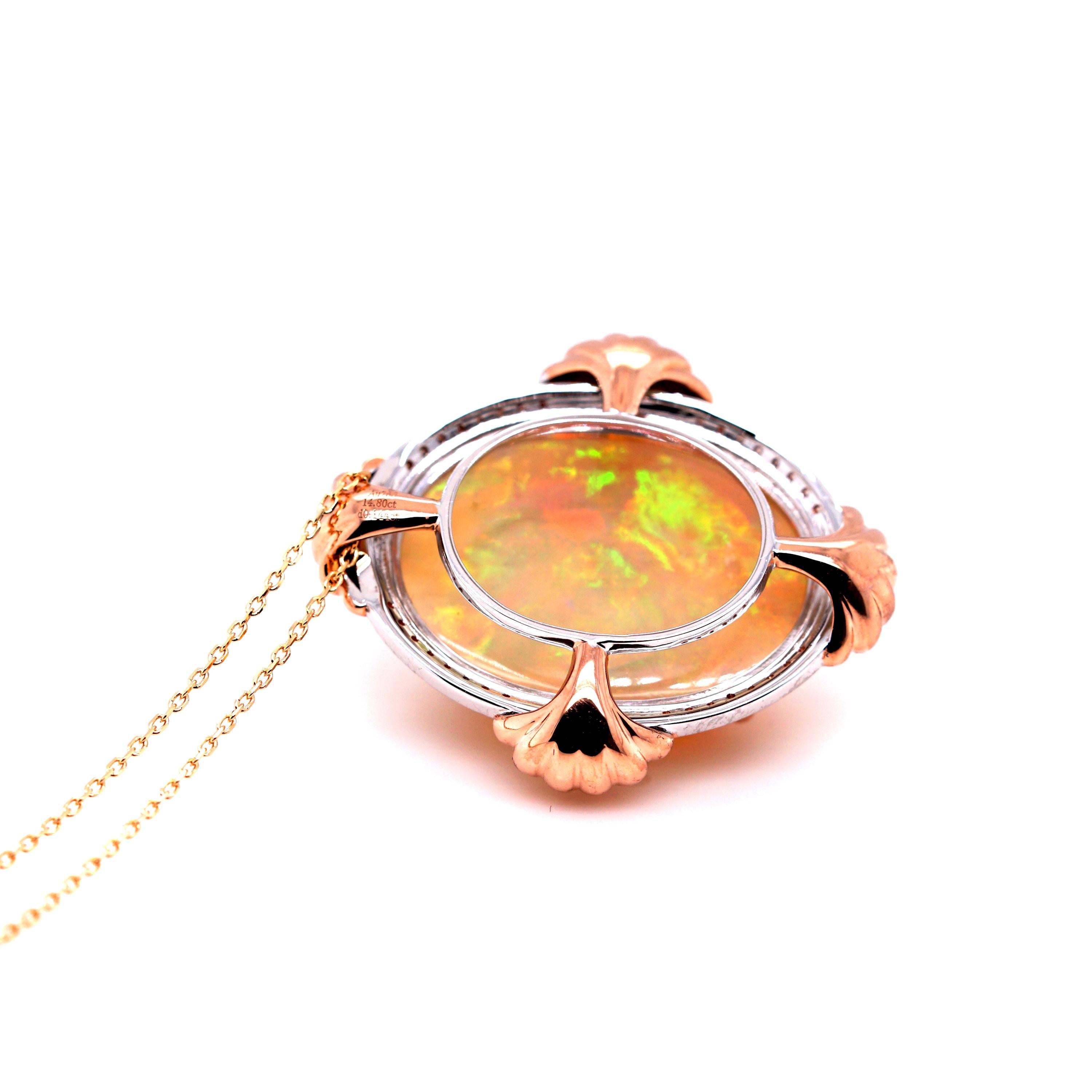 Description:
An 18ct white gold original design by Fei Liu, featuring an opulent 14.8ct opal, framed with diamonds and rose gold accents of sea shell motifs.

- Weight: 10gm
- Size (HxWxD): 30 x 25 x 13mm
- Chain length: 16 inches + 2-inch