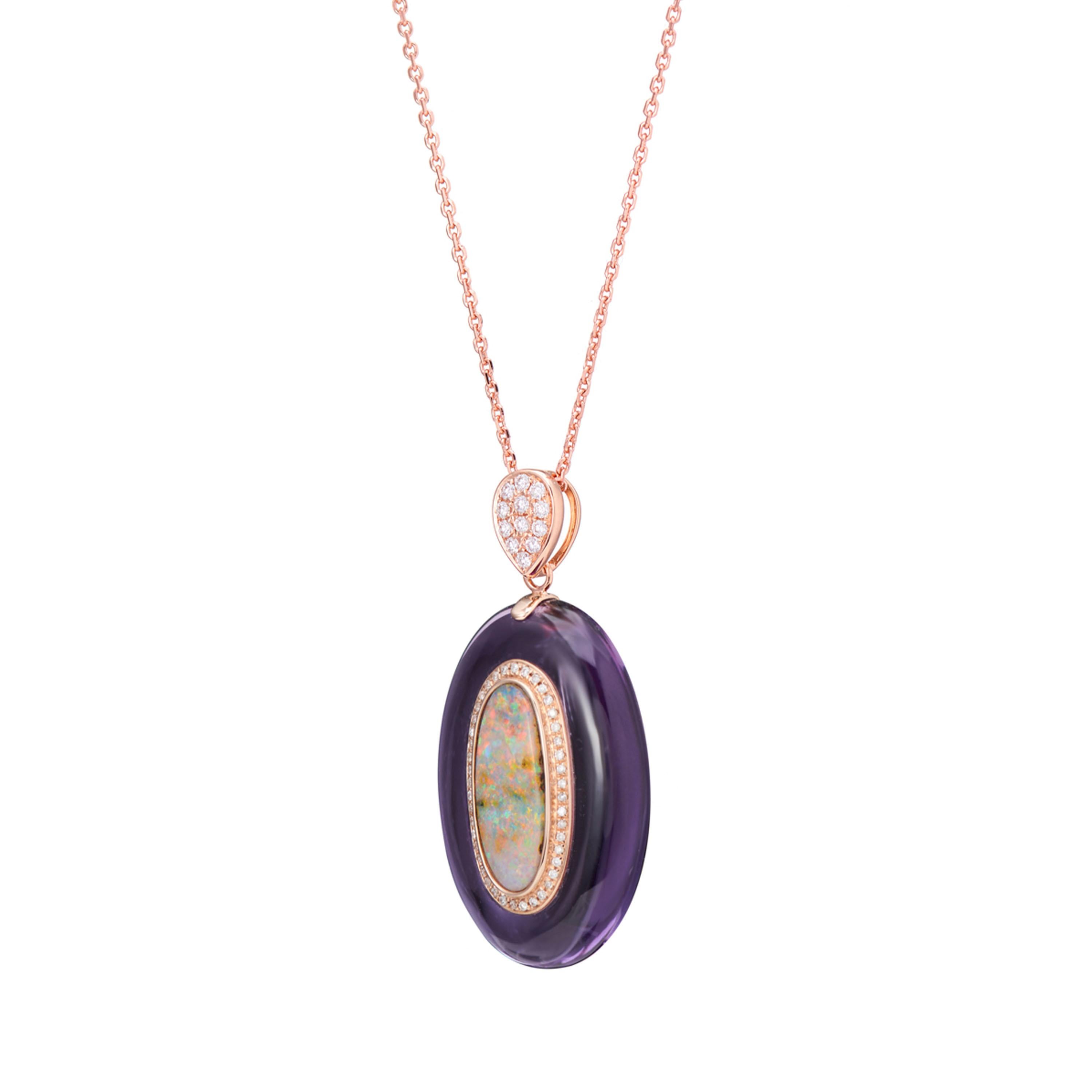 Description:
Modern classic keepsake using a combination of birthstones. Our one-of-a-kind pendant features a 18.6ct polished amethyst cabochon inlaid with a prismatic opal. The classic touch comes in form of diamond brilliance that total 0.173ct in