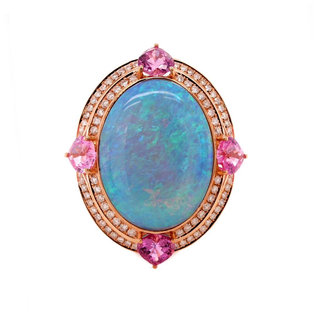 A beautiful medley of gemstones combines in this one-of-a-kind ring by Fei Liu to create a bold ring with stunning contrast. A cocktail ring featuring a central ocean-blue opal with a total weight of 9.28ct, decorated with graduated hallows of