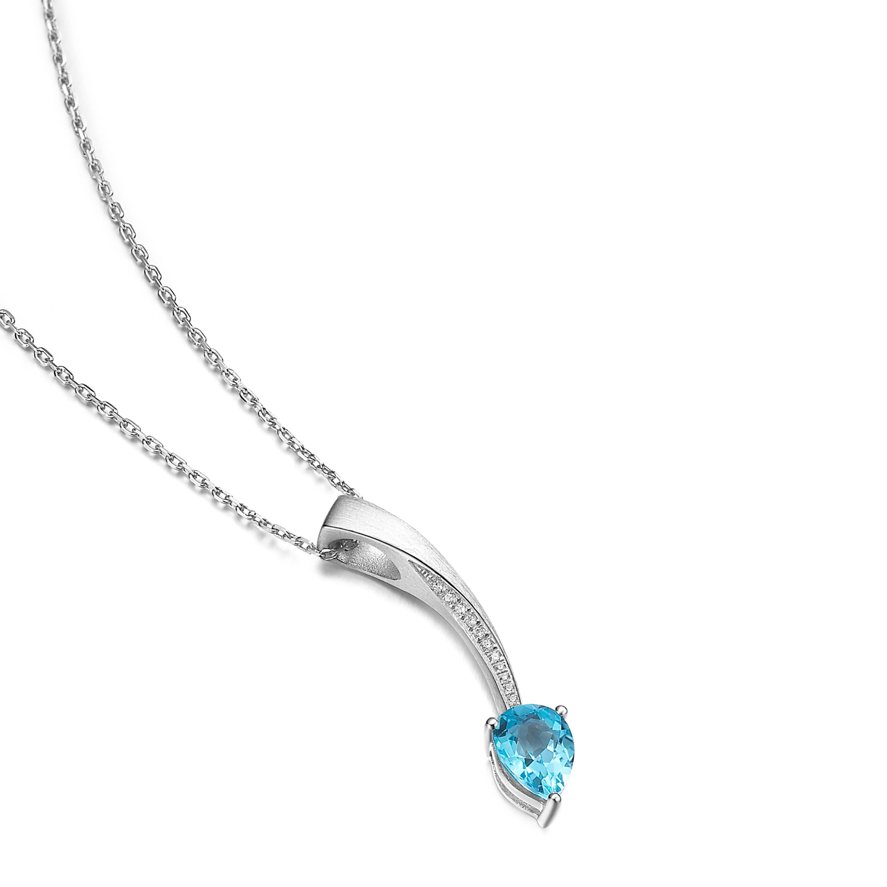 Description:
Shooting Star short pendant with pear cut blue topaz and Hearts and Arrows* white cubic zirconia, set in brush polished white rhodium plate** on sterling silver.  Chain length is 16 inches + 2 inch extension

*Hearts and Arrows refer to