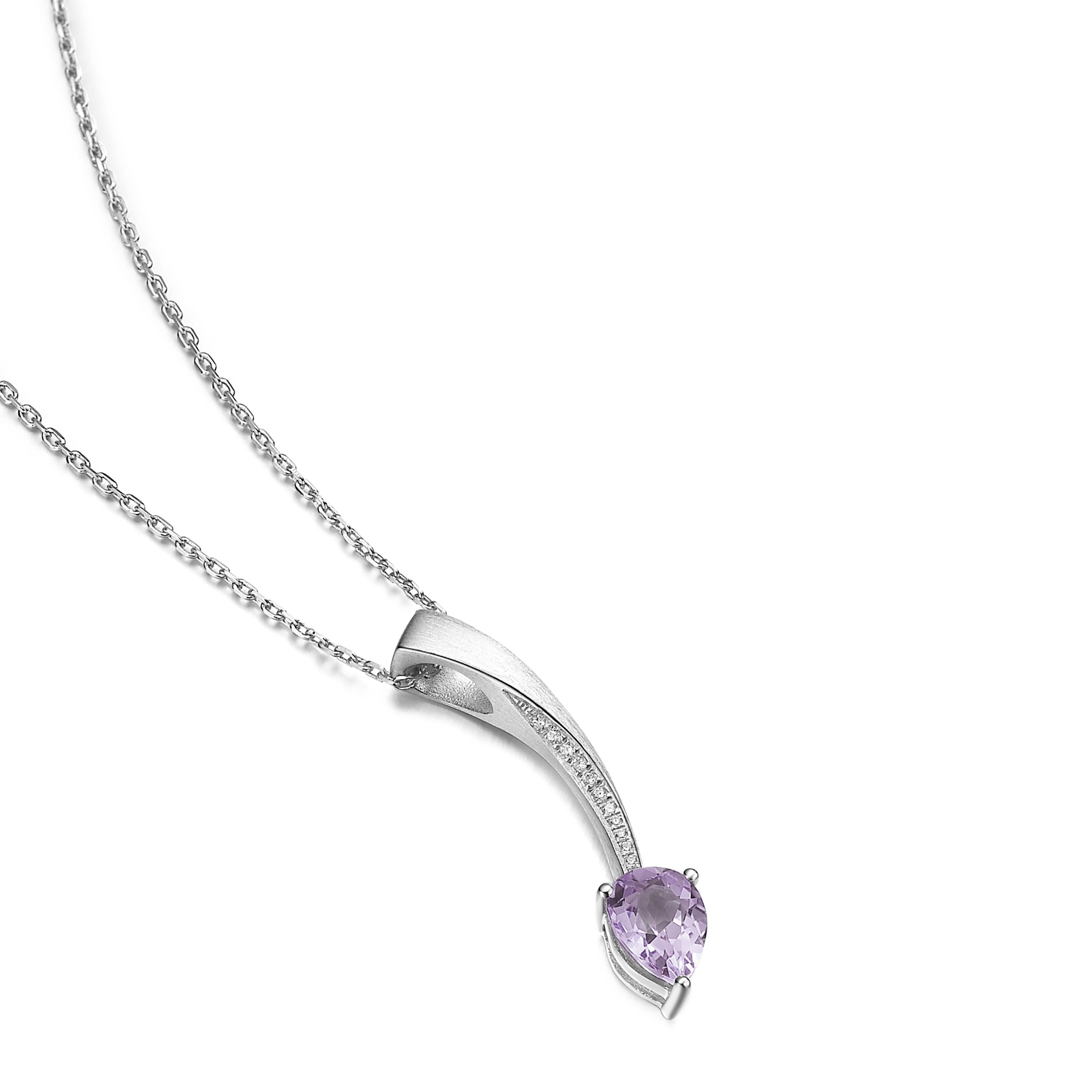 Description:
Shooting Star short pendant with pear cut purple amethyst and Hearts and Arrows* white cubic zirconia, set in brush polished white rhodium plate** on sterling silver.  Chain length is 16 inches + 2 inch extension

*Hearts and Arrows