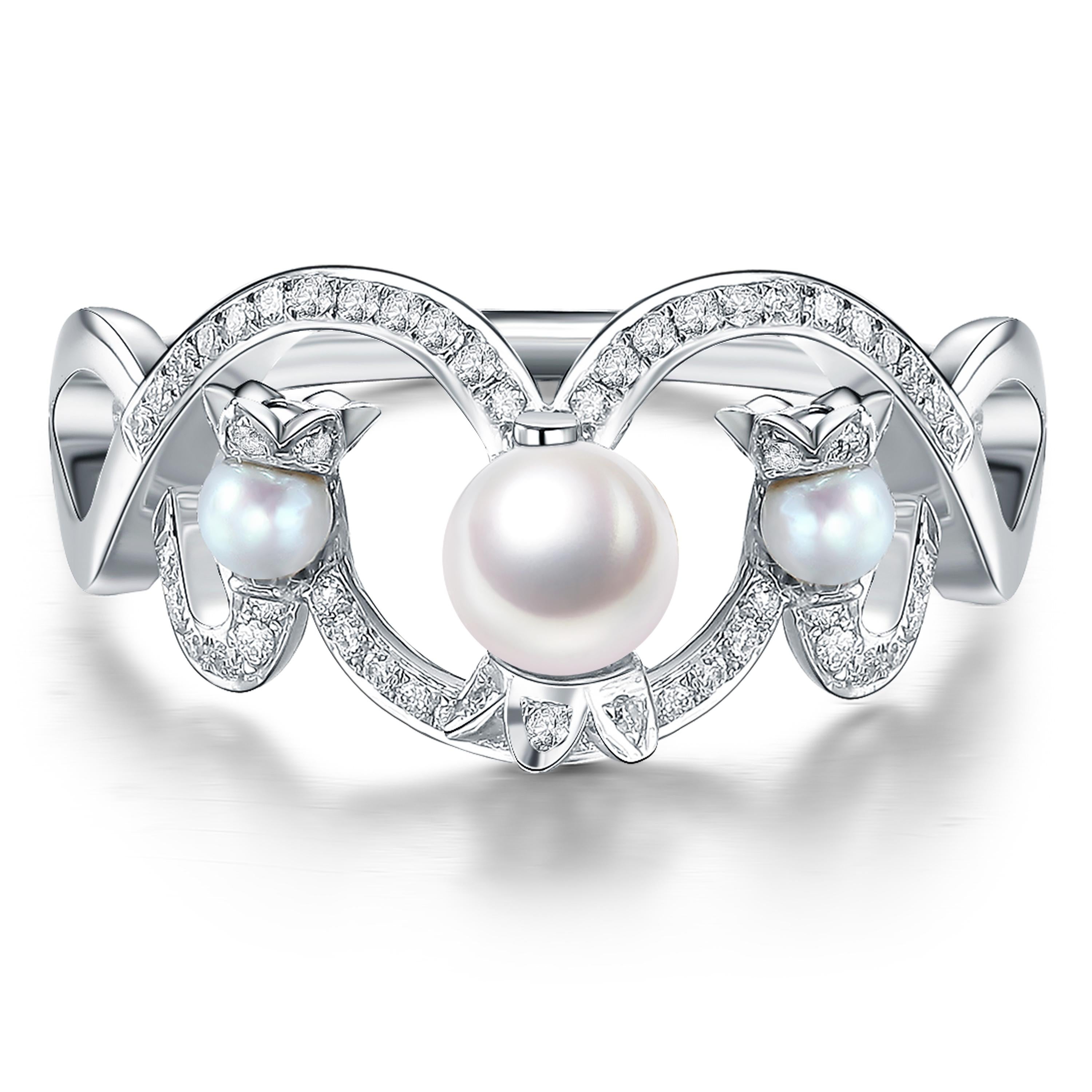 Lily of the Valley large ring with 1-3mm pearls and 0.2ct white diamonds, set in 9ct white gold with a high polish.

- Size (LxW): 20mm x 10mm
- Weight: 2.7gm
- Ring size: M1/2

Fei Liu Fine Jewellery is an independent jewellery designer brand based