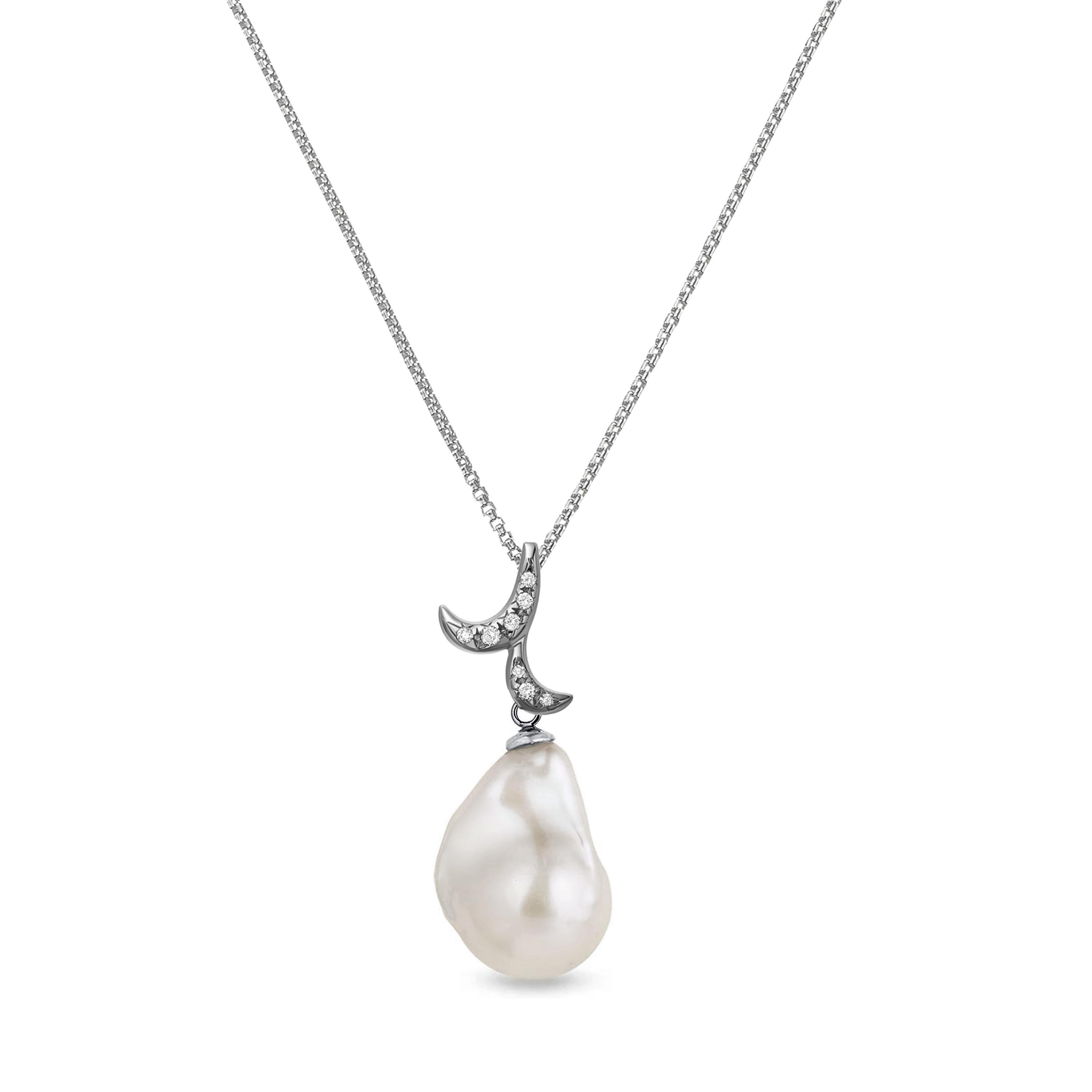 Description:
Whispering baroque pearl pendant with 0.03ct white diamonds and a 12mm x 14mm baroque pearl, set in black rhodium plate on 18ct white gold.
- Size (LxW): 28mm x 10mm
- Weight: 4.2gm
- Stones: diamonds total weight = 0.03ct, baroque