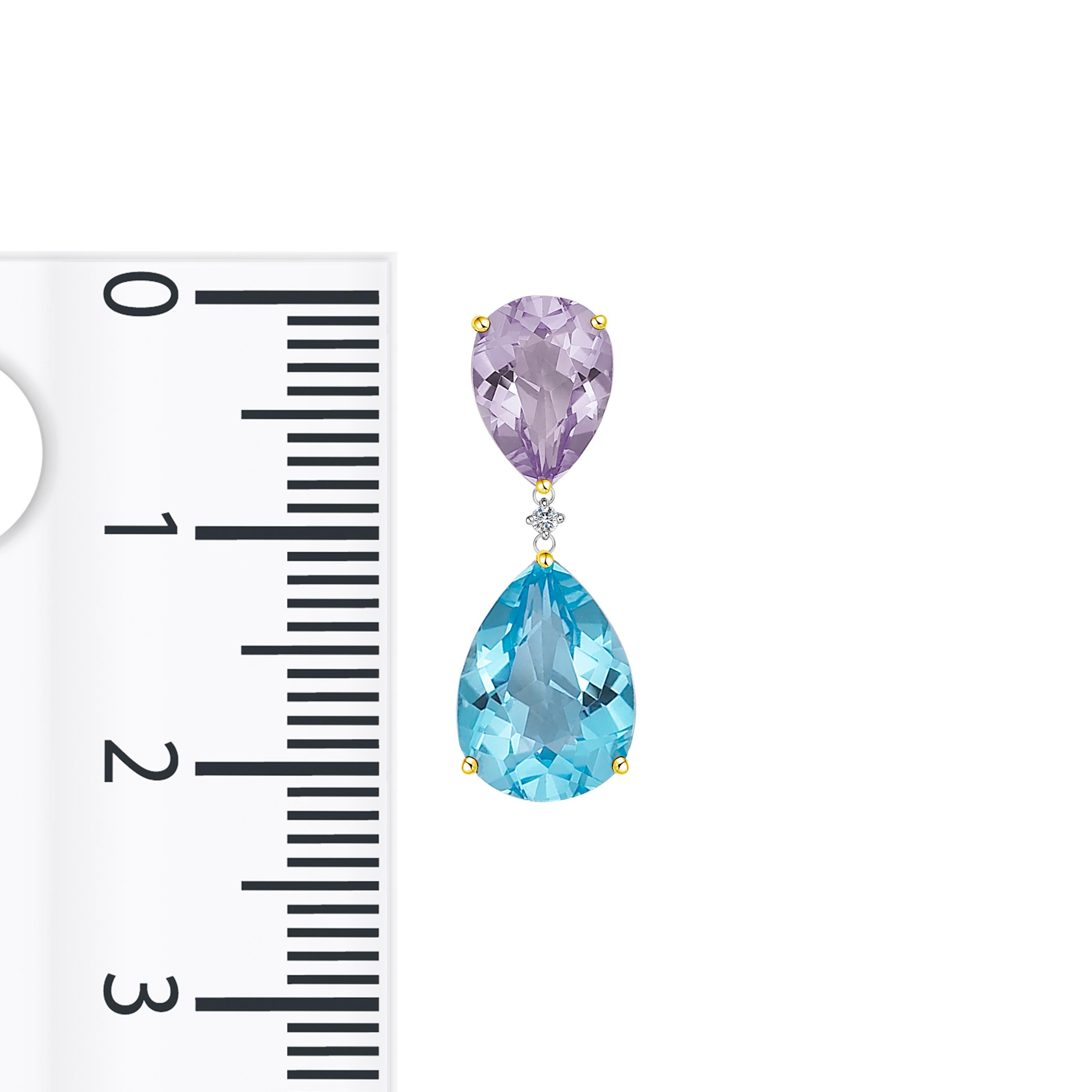 Description:
Add a touch of colour to your look with bright, breathtaking gemstones. These drop earrings feature 2.20ct purple amethysts, 0.038ct diamonds and 7.05ct blue topazes set in 18ct white gold with yellow gold-plated