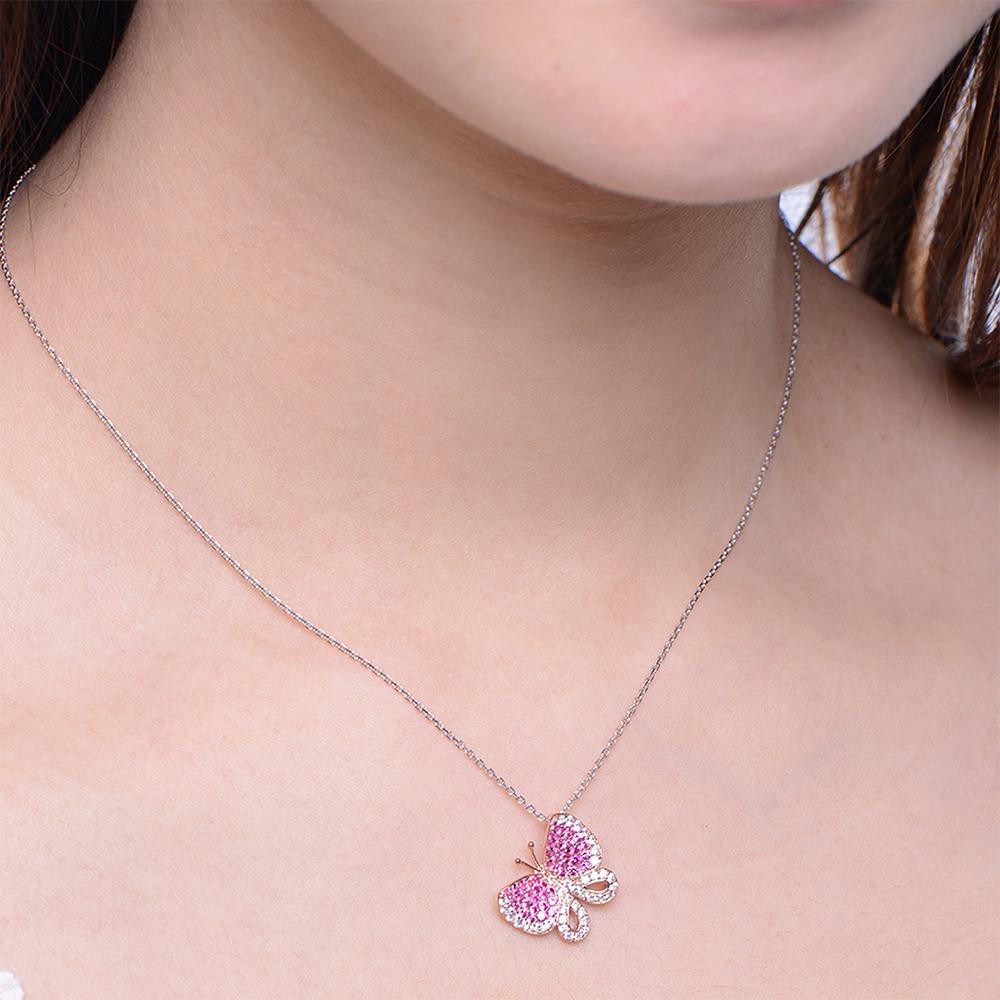 Butterfly captures the feminine essence and the carefree, joyful movement of these intricate and delicate creatures in sparkling weightless jewels. Butterfly pendant with wings bejewelled in ruby pink and white cubic zirconia set in rose gold plate
