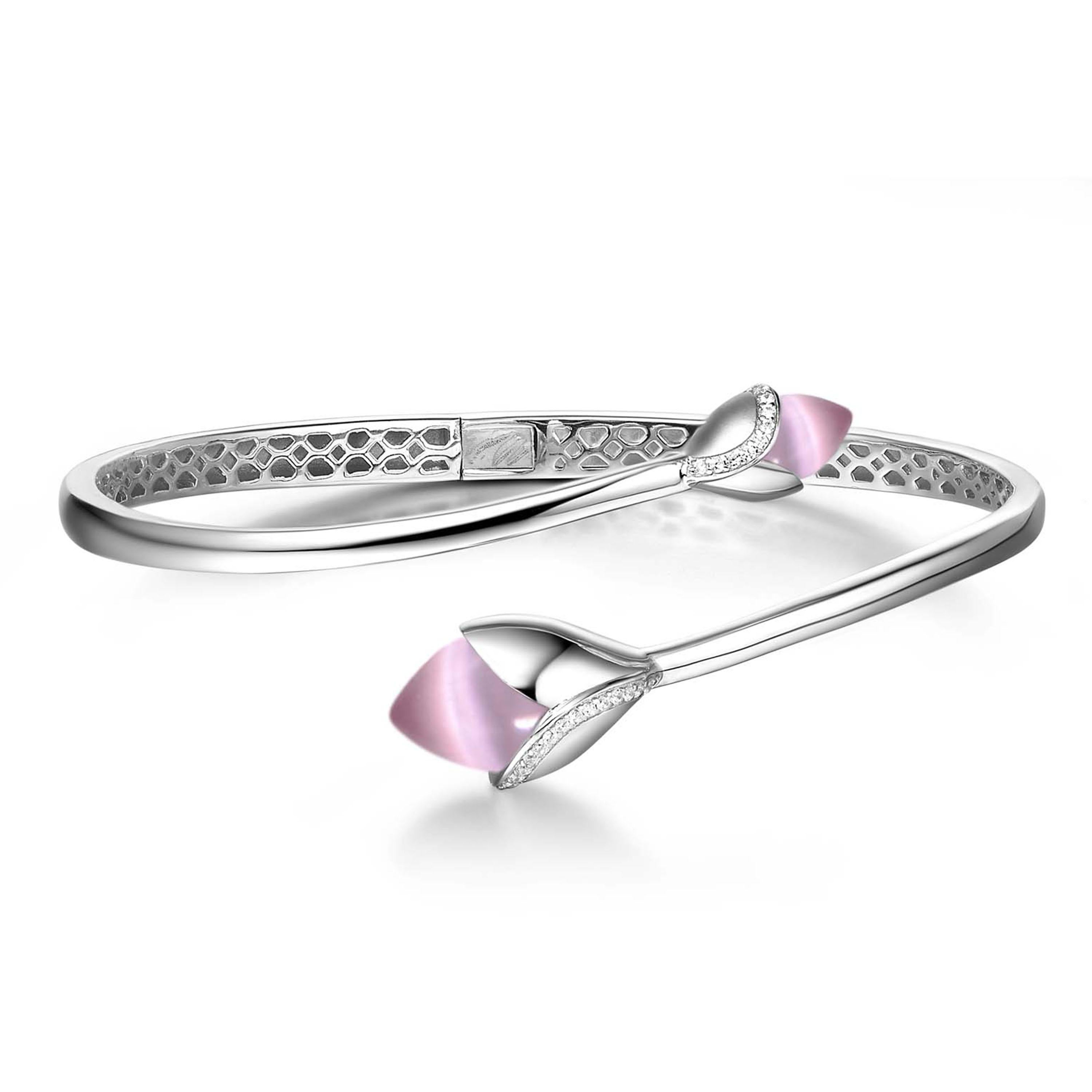 Description:
Magnolia bangle pink cat’s eye stone and cubic zirconia, set in satin and mirror polish white rhodium plate on sterling silver.

Inspiration:
This capsule collection blossoms with the pretty cat’s eyes and dew drops of 8 hearts and 8