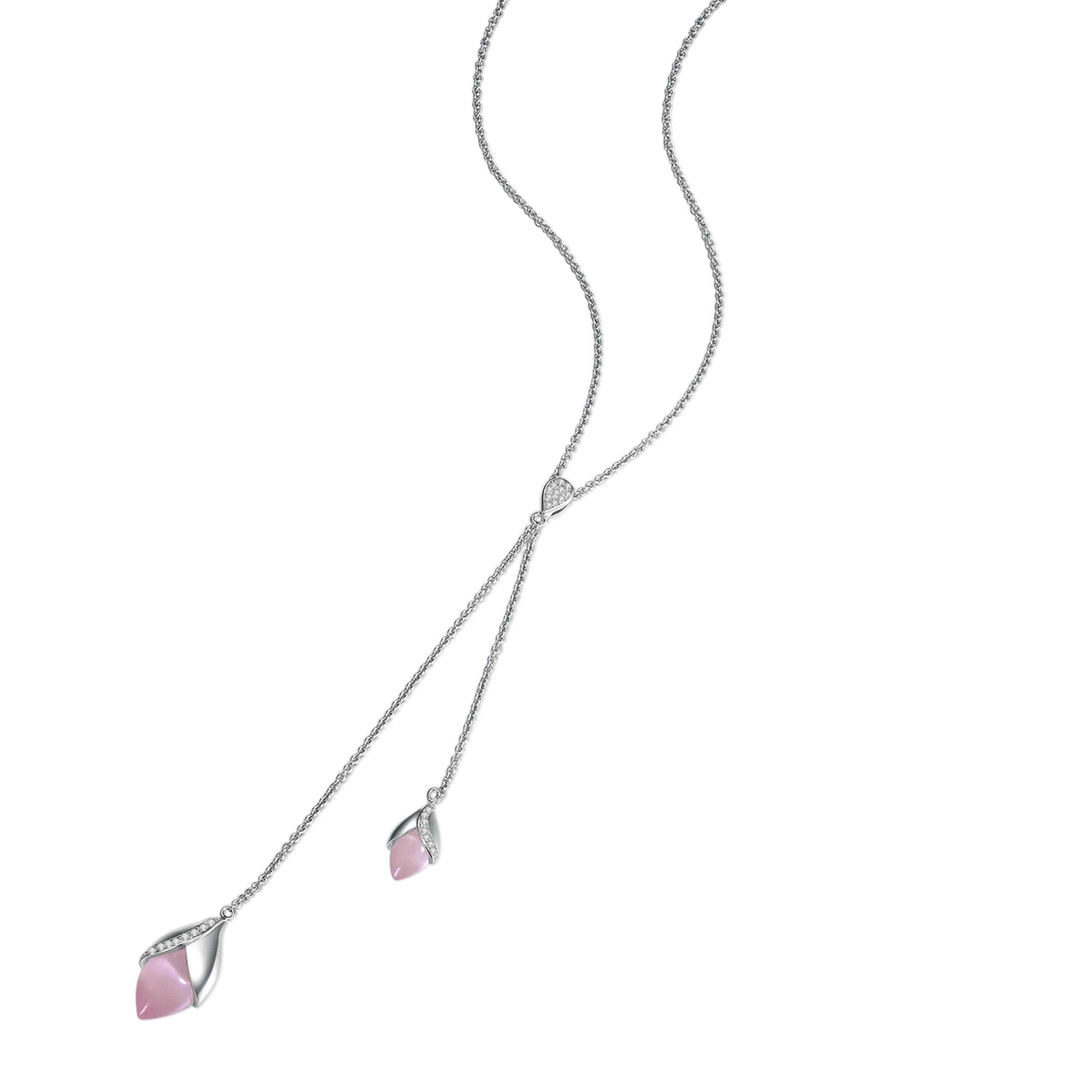 Description:
Magnolia lariat necklace with two pink cat's eye stones in varying sizes and cubic zirconia, set in satin and mirror polish white rhodium plate on sterling silver.

Inspiration:
This capsule collection blossoms with the pretty cat’s