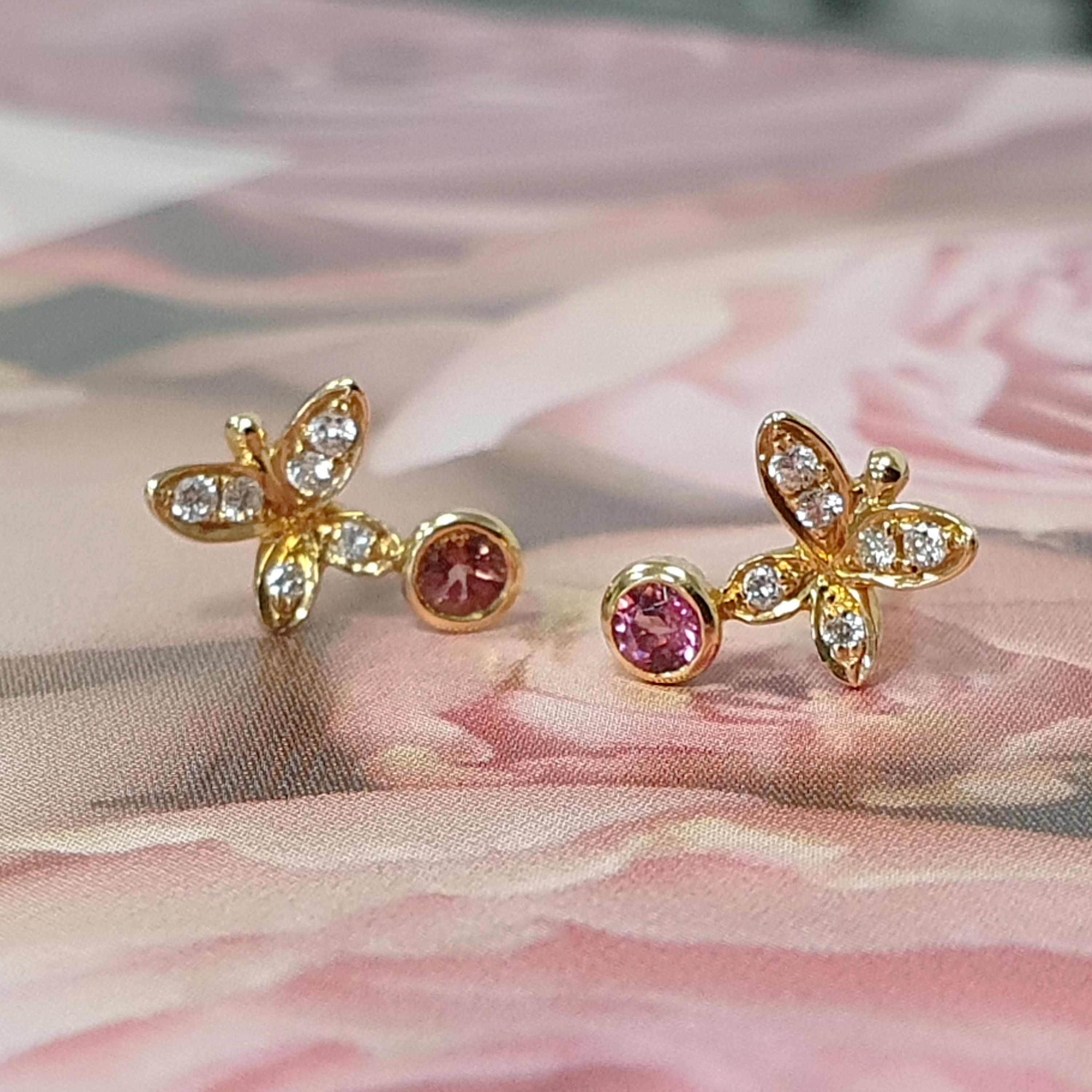 Description:
Dainty butterfly earrings from the Fei Liu 'Buddleia' collection, featuring 0.056ct diamond set butterflies with 0.1ct pink tourmalines, set in 18ct yellow gold.

Inspiration:
Fei Liu Buddleia explores the irresistible allure of fine