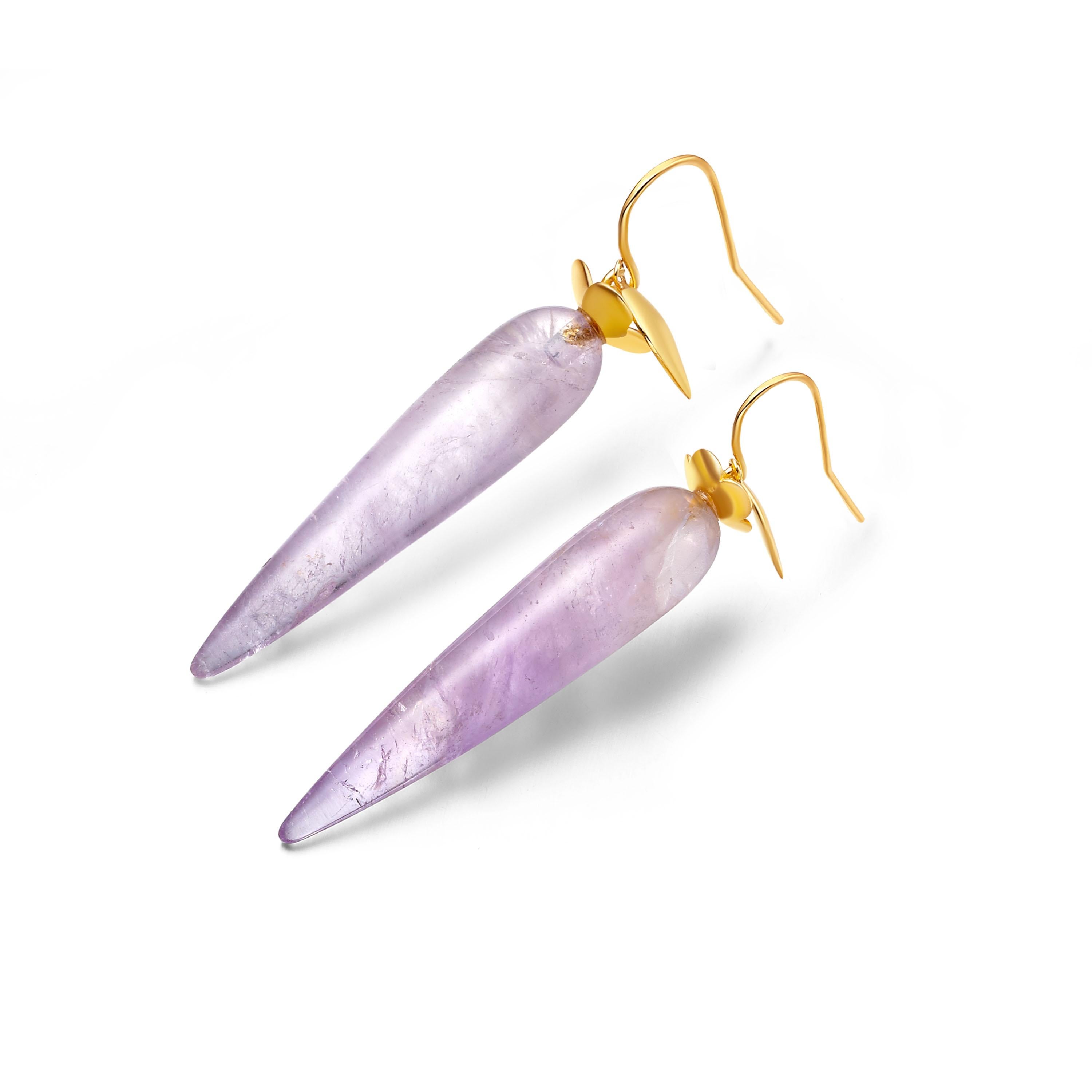 Elegant drop earrings with a touch of lavender, featuring teardrops of purple amethyst with excellent translucency, adorned with delicate petals of 18ct gold plate on sterling silver.

- Size (LxW): 51mm x 9mm
- Weight per earring: 5.2gm
- Earring