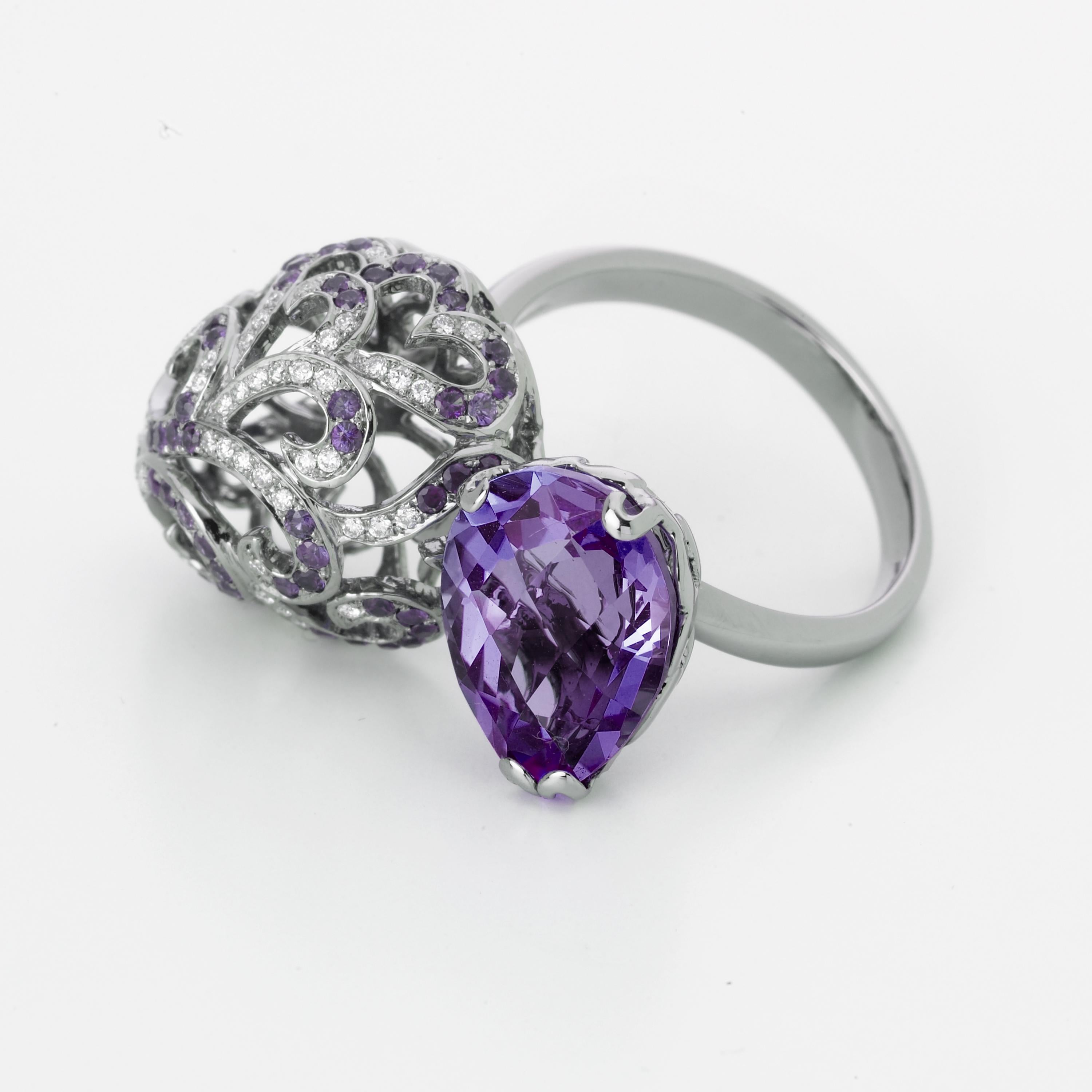 Emulating femininity and glamour, the Whispering collection is full of colour and form. Inspired by the feminine, sculptural shape of the exotic Orchid flower. Whispering large double ring with 4.5ct purple amethyst, domed filigree of 0.3ct white