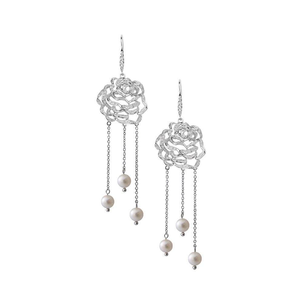 The Rose Chandelier Earrings are a breathtaking fusion of elegance and sophistication, designed to make a statement. Each hook earring showcases a beautifully crafted rose, embellished with shimmering gemstones that catch the light with every