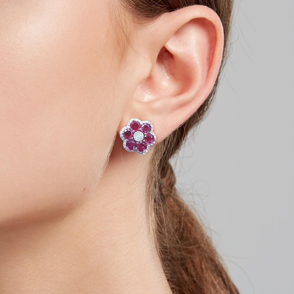 Step into the bejewelled garden and cast your eyes on this pair of floral-inspired stud earrings. This pair of earrings features raspberry pink rubies with a total weight of 3.67ct, delicately framed with 0.458ct diamonds. Crafted in 18ct rose gold