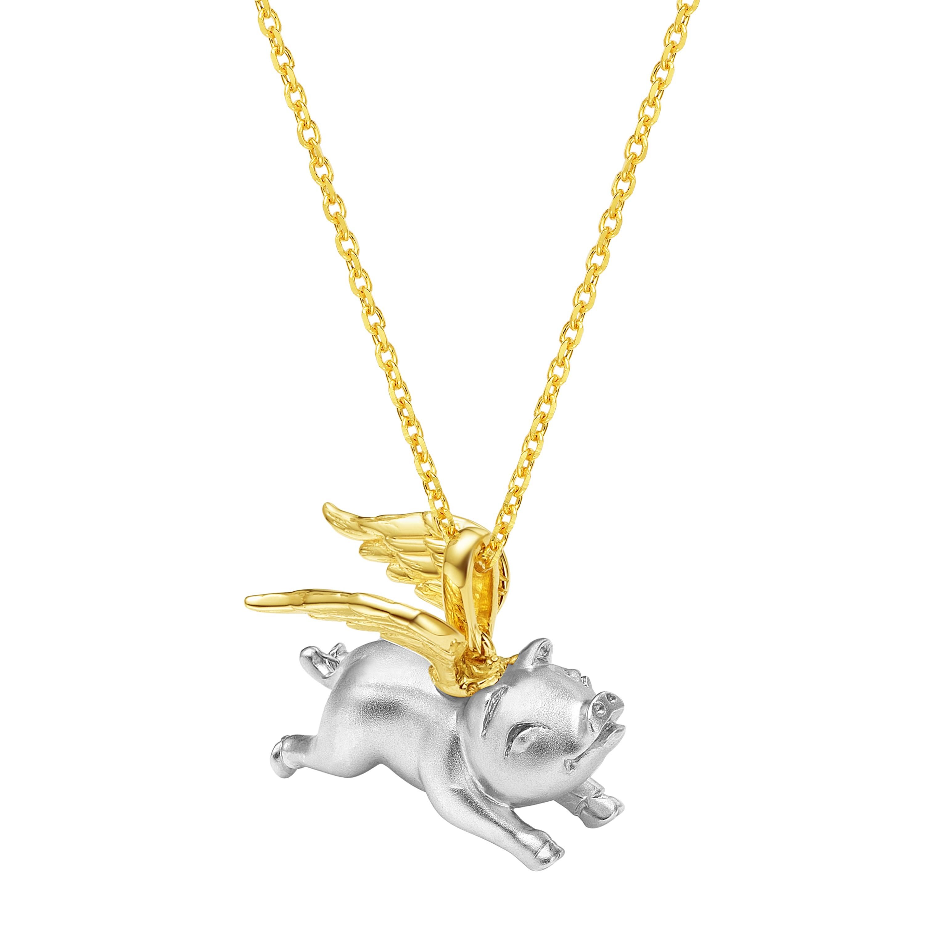 Pig pendant and bracelet with a hand-carved solid silver pig and yellow gold plated fluttering wings. It comes packaged with a 16 inches + 2-inch extension 14k yellow gold plated sterling silver chain and a 7-inch red cord, for the versatility of