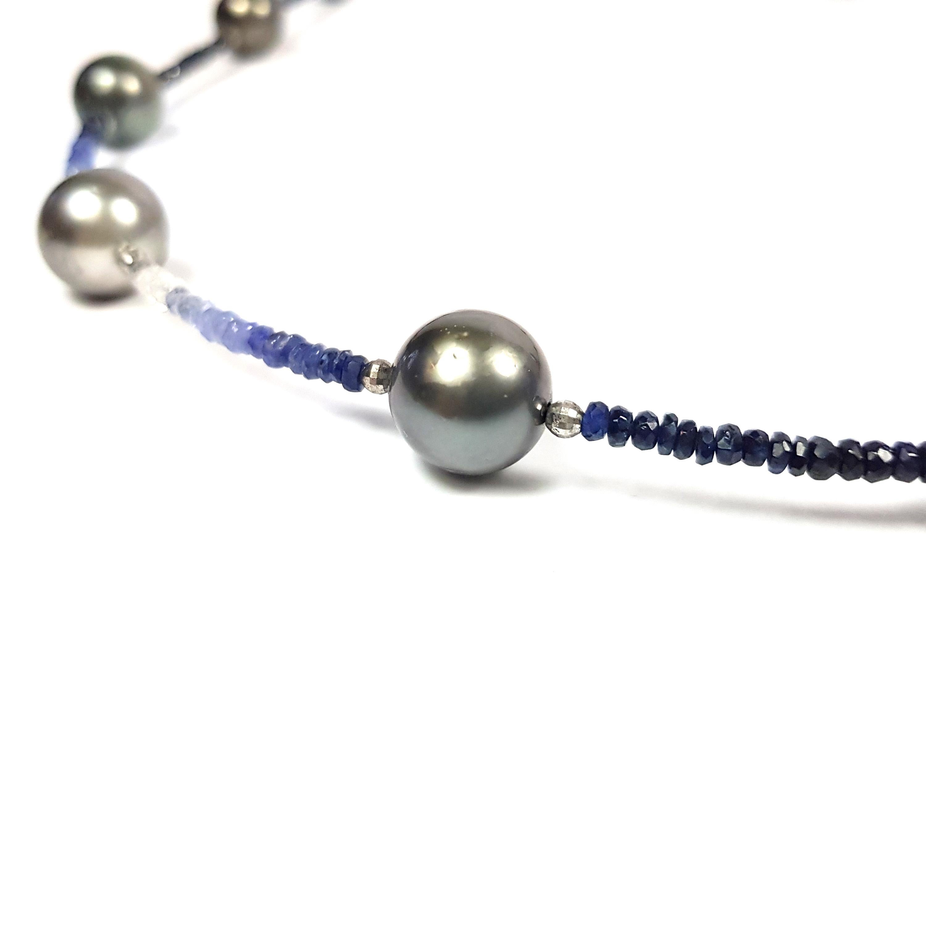 Fei Liu Fine Jewellery 24 inches long Tahitian pearl (11 pcs) necklace, with beautiful hues of blue sapphires. Exotic with a refined mix of elegance. 