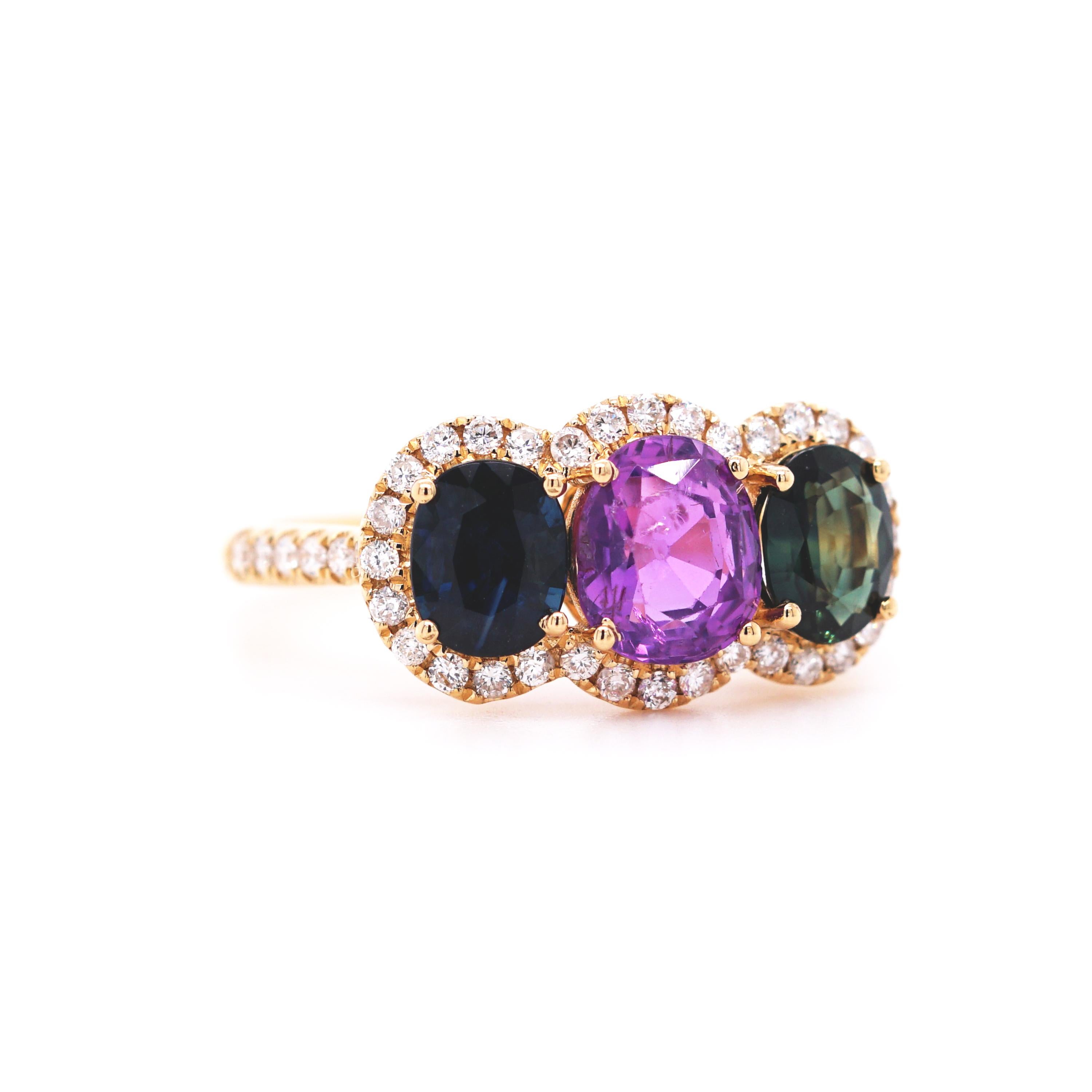 Description:
A three-stone ring featuring multicolour natural sapphires in blue, pink and green. Decorated with a border and shoulders set with diamonds.
- Weight: 3.7g
- Ring size: N (UK) / 6.75 (US)

About Fei Liu Fine Jewellery: 
Hello! We are