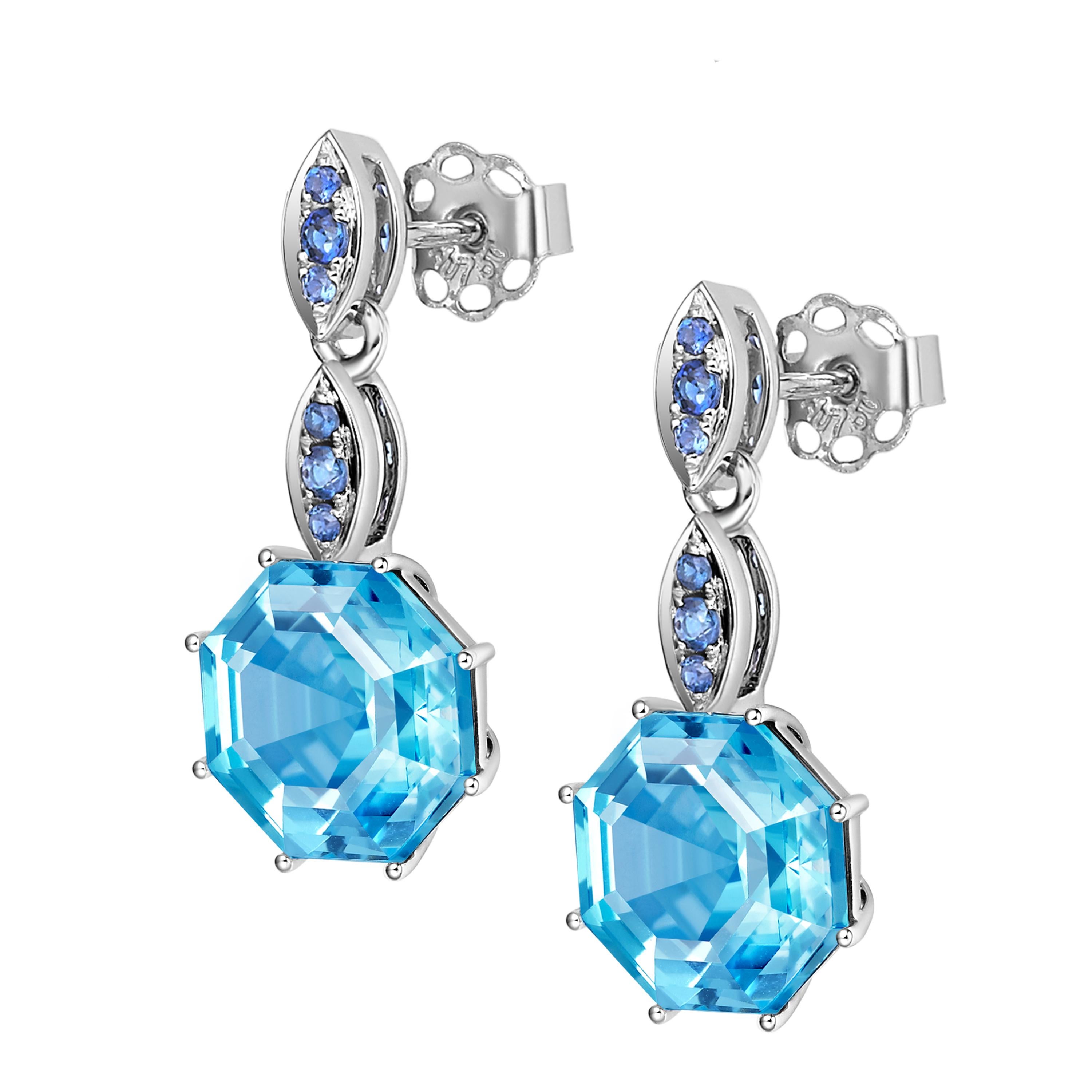 Description:
Victoriana small octagon cut short drop earrings with 4.46ct blue topaz and 0.13ct blue sapphires, set in 18ct white gold.

Inspiration:
A deluxe 18ct gold collection inspired by Victorian design. Fei Liu’s Victoriana collection