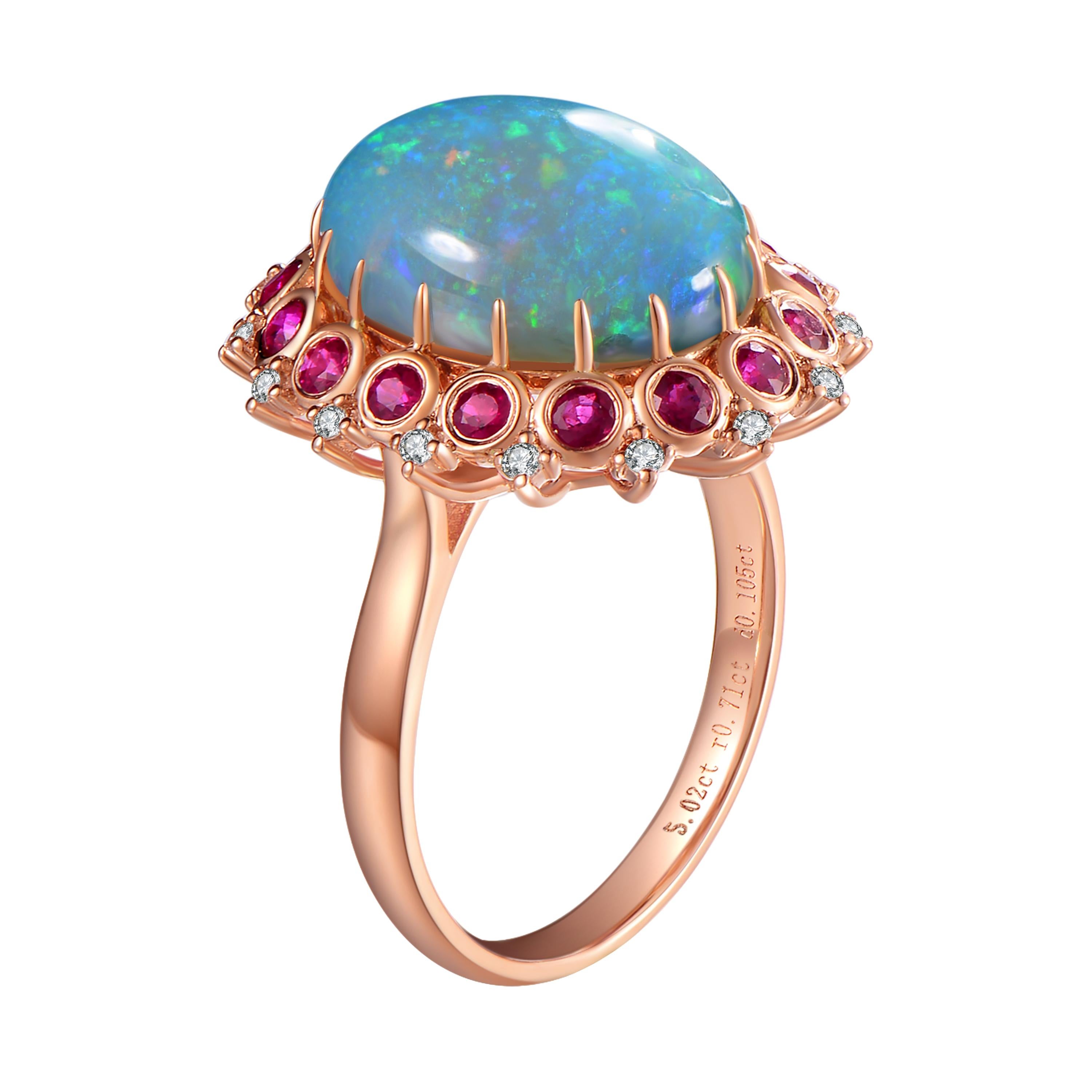 Description:
An exquisite cluster ring from the limited edition collection of Fei Liu Fine Jewellery. This ring features a 5.02ct iridescent boulder opal. The colour-of-play within the opal is beautifully complemented with a border of 0.71ct rubies