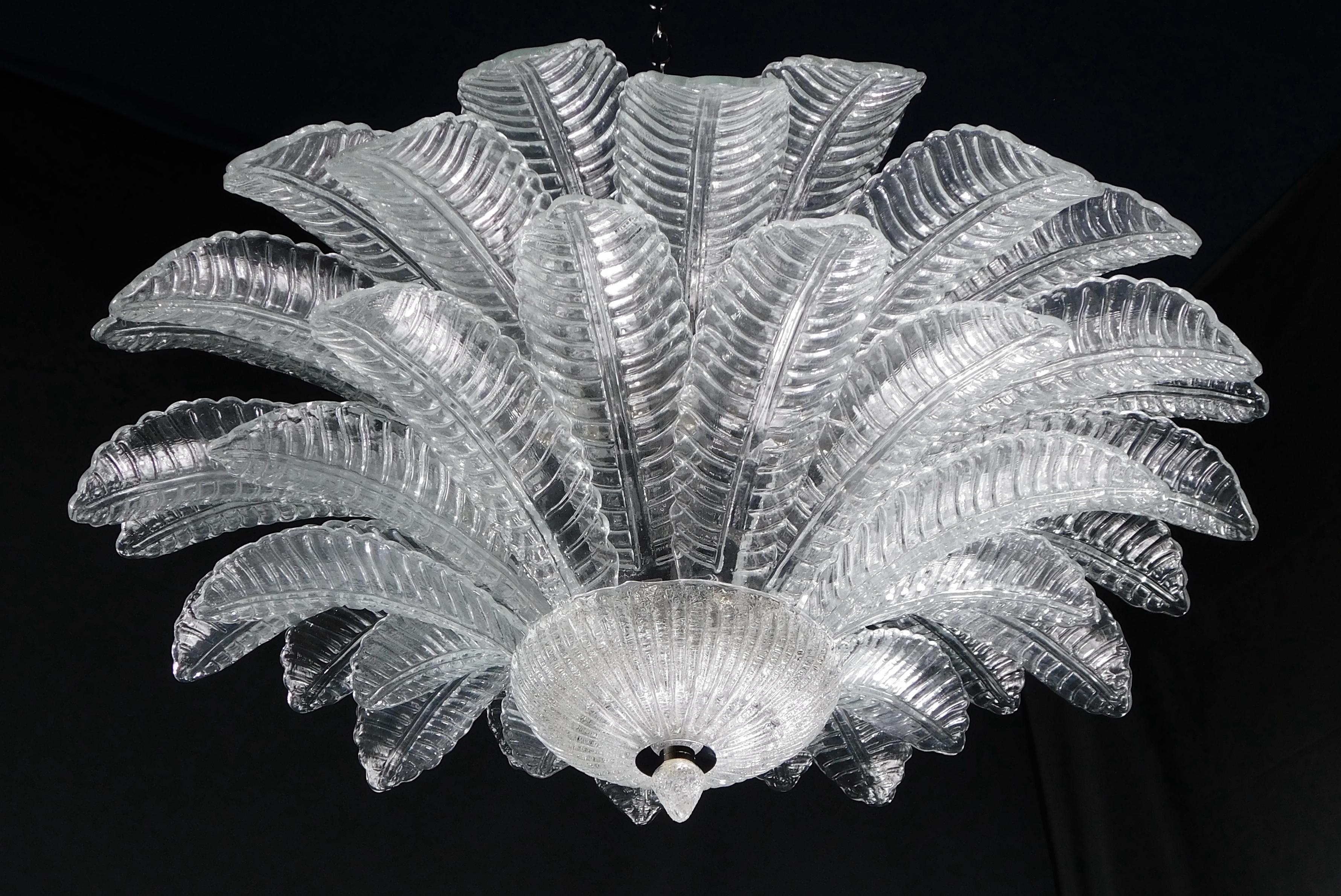 Italian flush mount with clear hand blown Murano Felci fern glass leaves mounted on chrome finish metal frame by Fabio Ltd / Made in Italy
9 lights / E26 or E27 type / max 60W each
Measures: Diameter 39.5 inches, height 18 inches
Order only / this