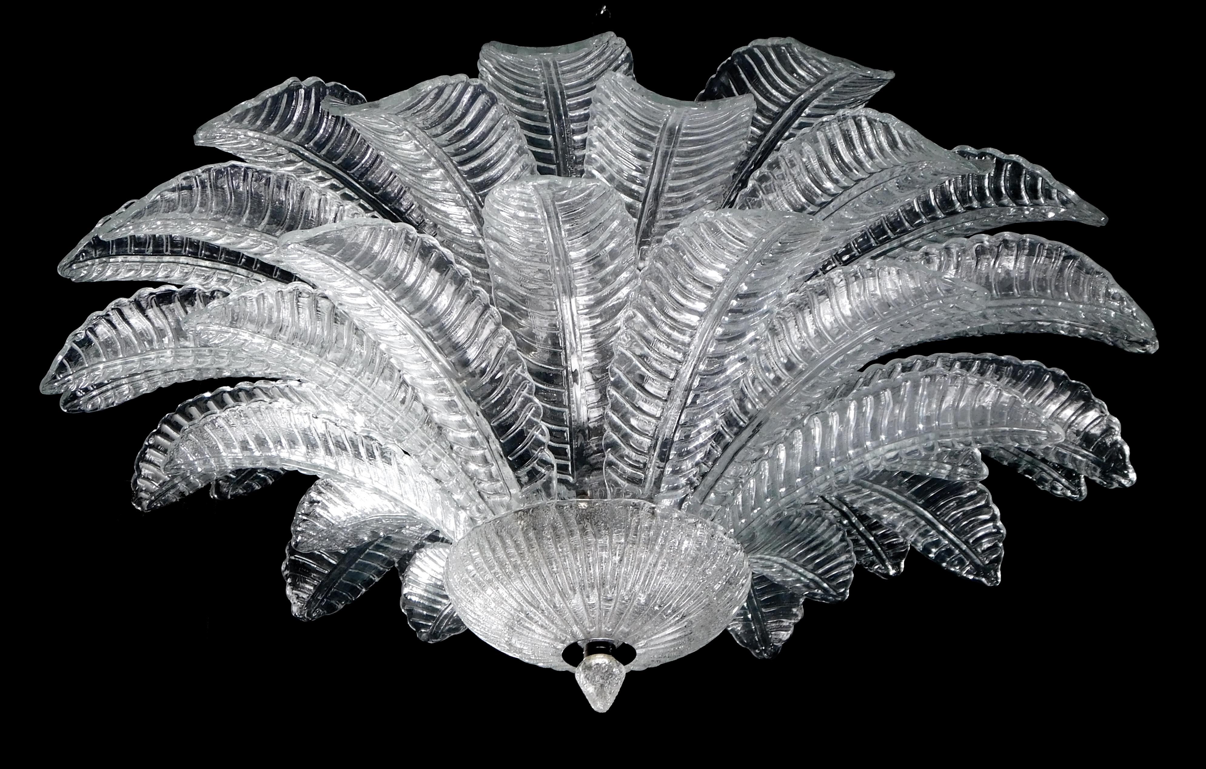 Italian flush mount with clear hand blown Murano Felci fern glass leaves mounted on chrome finish metal frame by Fabio Ltd / Made in Italy
9 lights / E26 or E27 type / max 60W each
Measures: Diameter 39.5 inches, height 18 inches
Order only / this