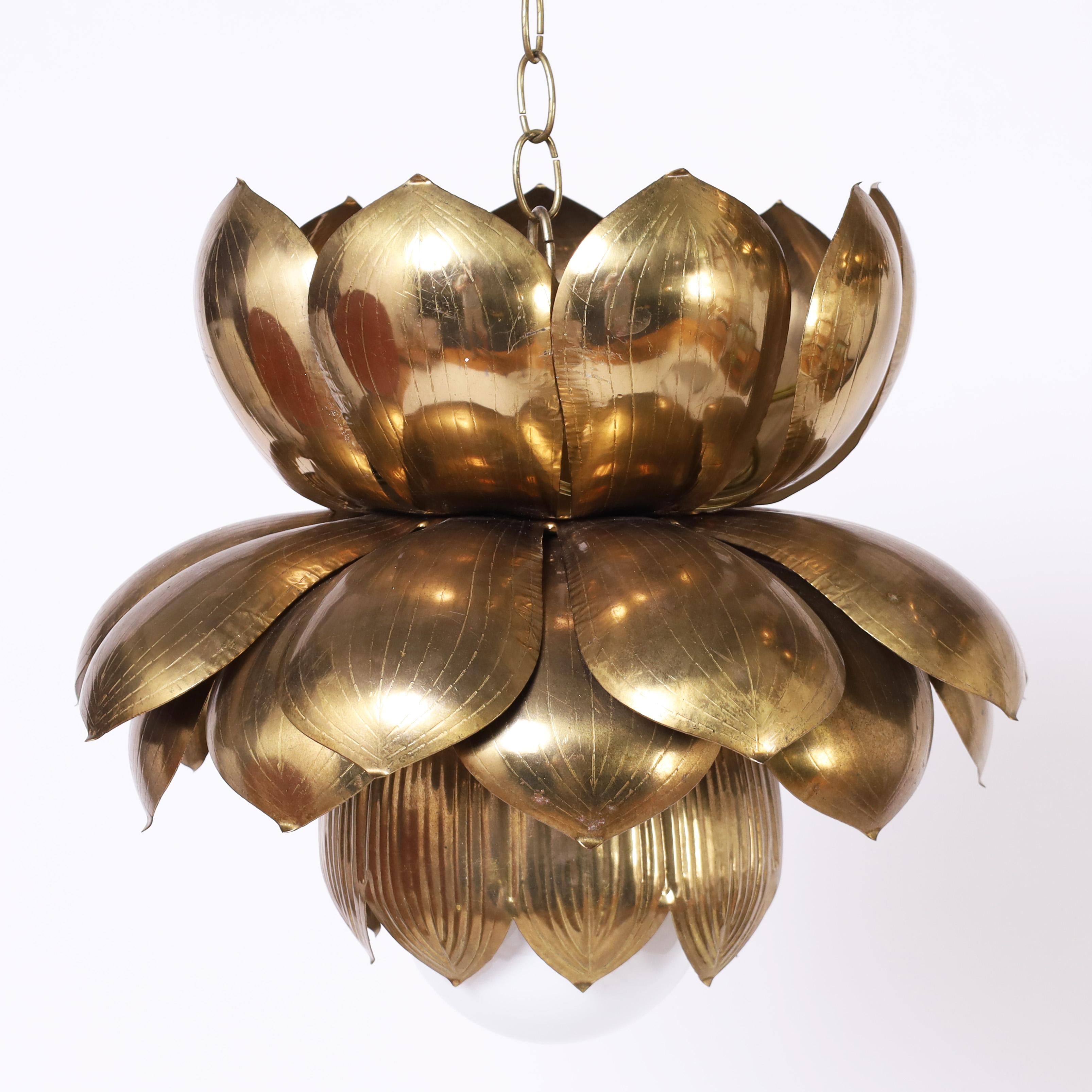 Chic rare pair of large vintage Feldman light fixtures crafted in brass in a modern stylized lotus flower form with etched petals. 