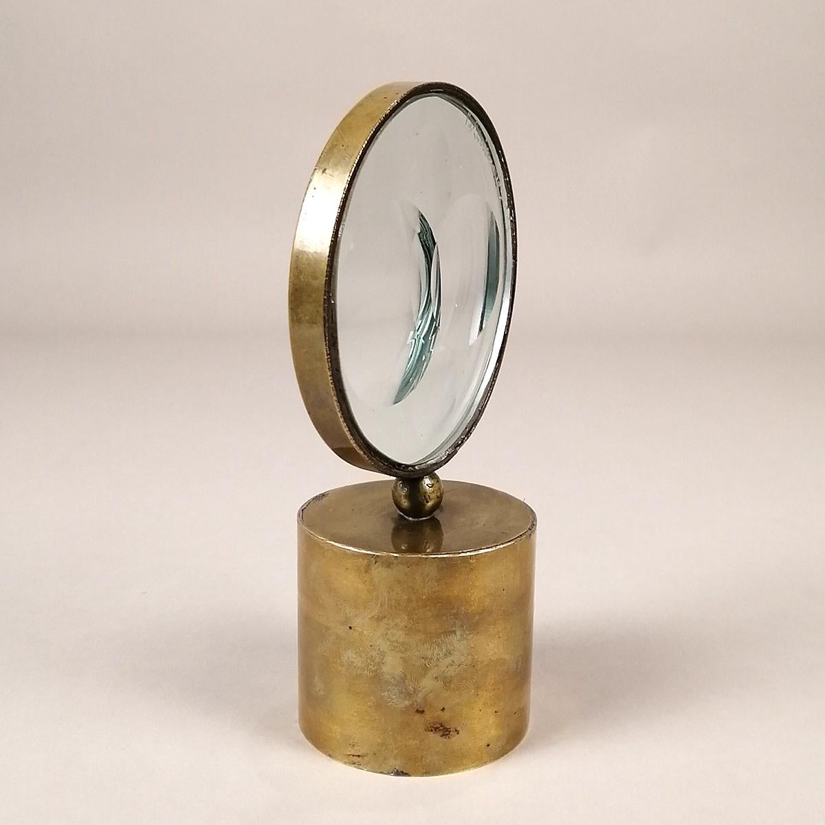A brass and polished glass 