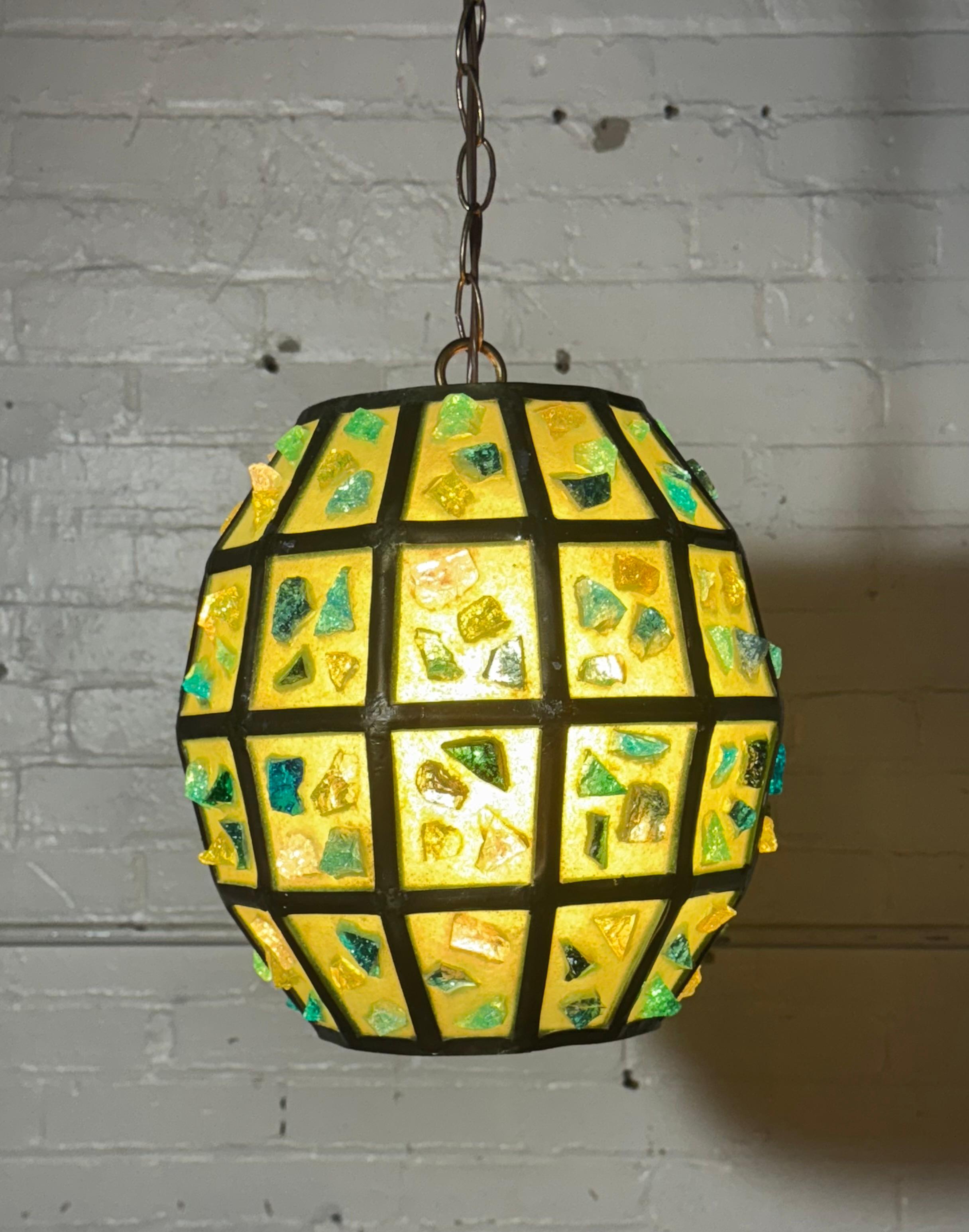 Classic matched pair Modernist Brutalist Chunk Glass Hanging Pendant Lamps attributed to Felipe Delfinger . Green lucite (plastic) with multi-color chunk glass. When lit ,they are a wonderful shade of lemon yellow.*****NOTE****Priced