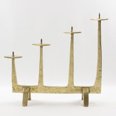 Candelabro modernista in bronzo dorato, portacandele Felix Agostini