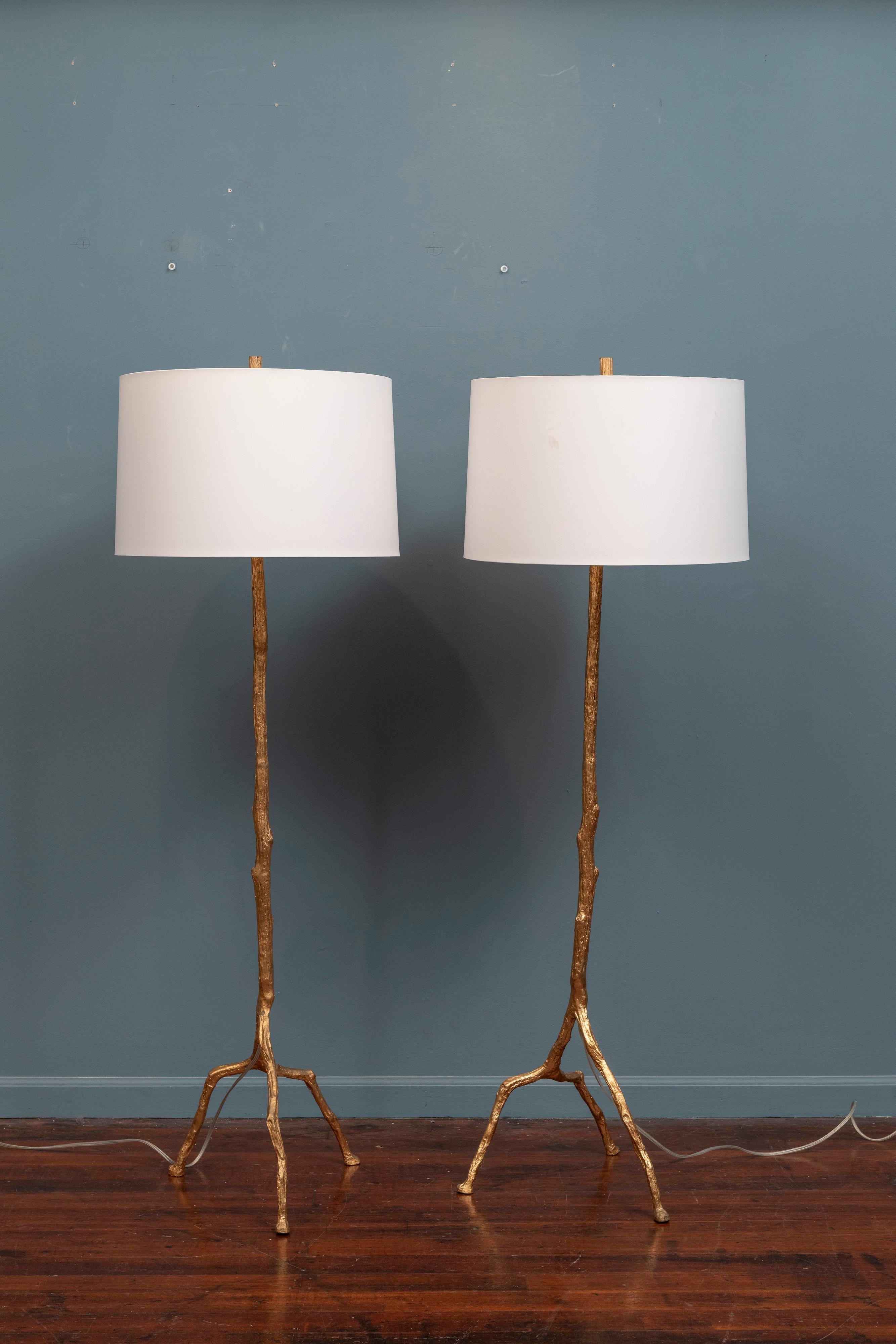 Felix Agostini style gilt-metal tree branch form floor lamps, made with high quality construction and attention to detail. 
A contemporary design with signs of use and wear to the shades and a three way socket, ready to install.