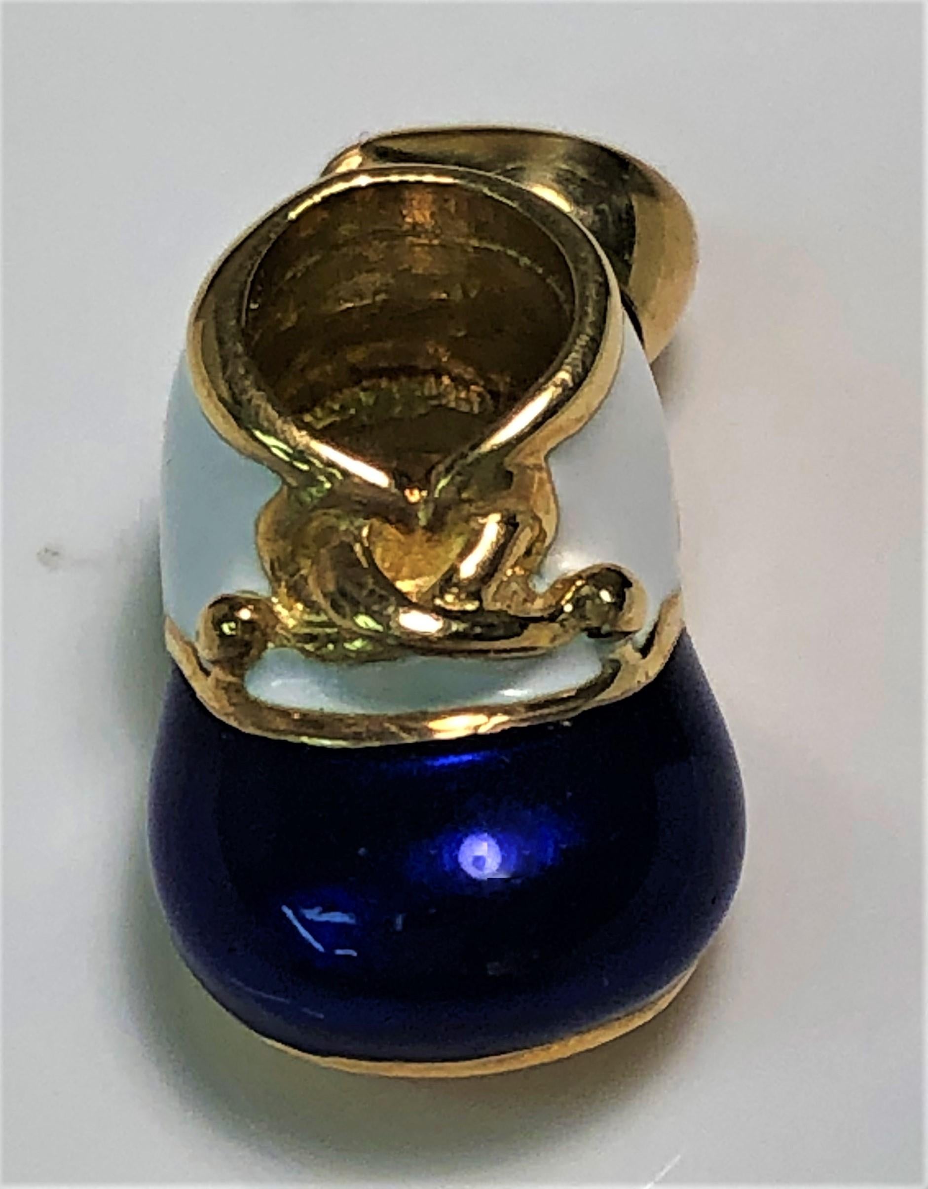 By designer Felix Vollman 
Detailed royal blue and white enamel.
18 karat yellow gold.
Bottom of the shoe can be engraved (not included in the price).
Can be worn as a pendant with a necklace and/or as a charm for a bracelet.
Just over 1