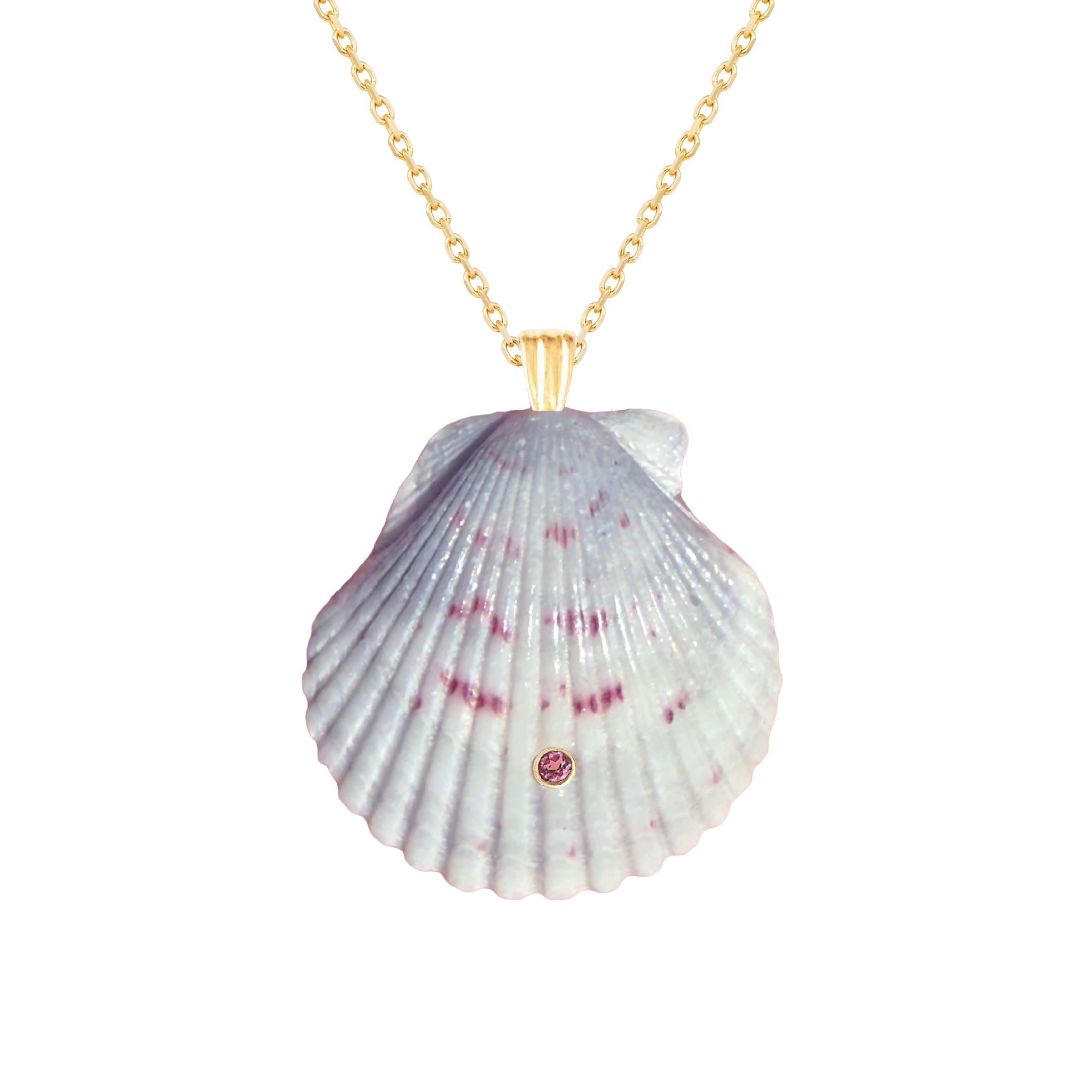 Natural shell pendant with solid 14k gold findings and natural rhodolite gemstone. Wear this pendant alone or layer it with other gold chains for a beautiful layered effect.  

Order includes one shell pendant, exactly as depicted in primary image.