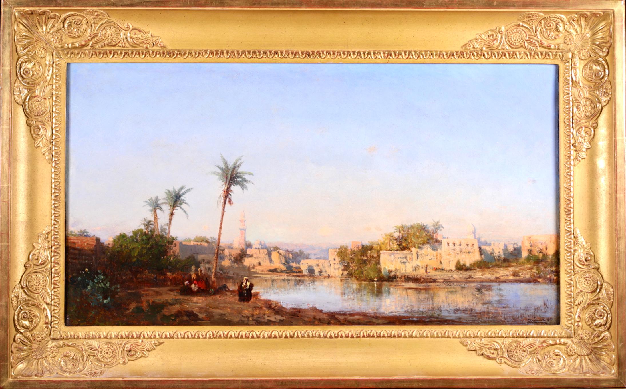 Signed orientalist landscape oil on canvas circa 1875 by French impressionist painter Felix Francois Georges Philbert Ziem. The work depicts a view of a town beside the River Nile. A very rare early work by Ziem painted during his year long trip to