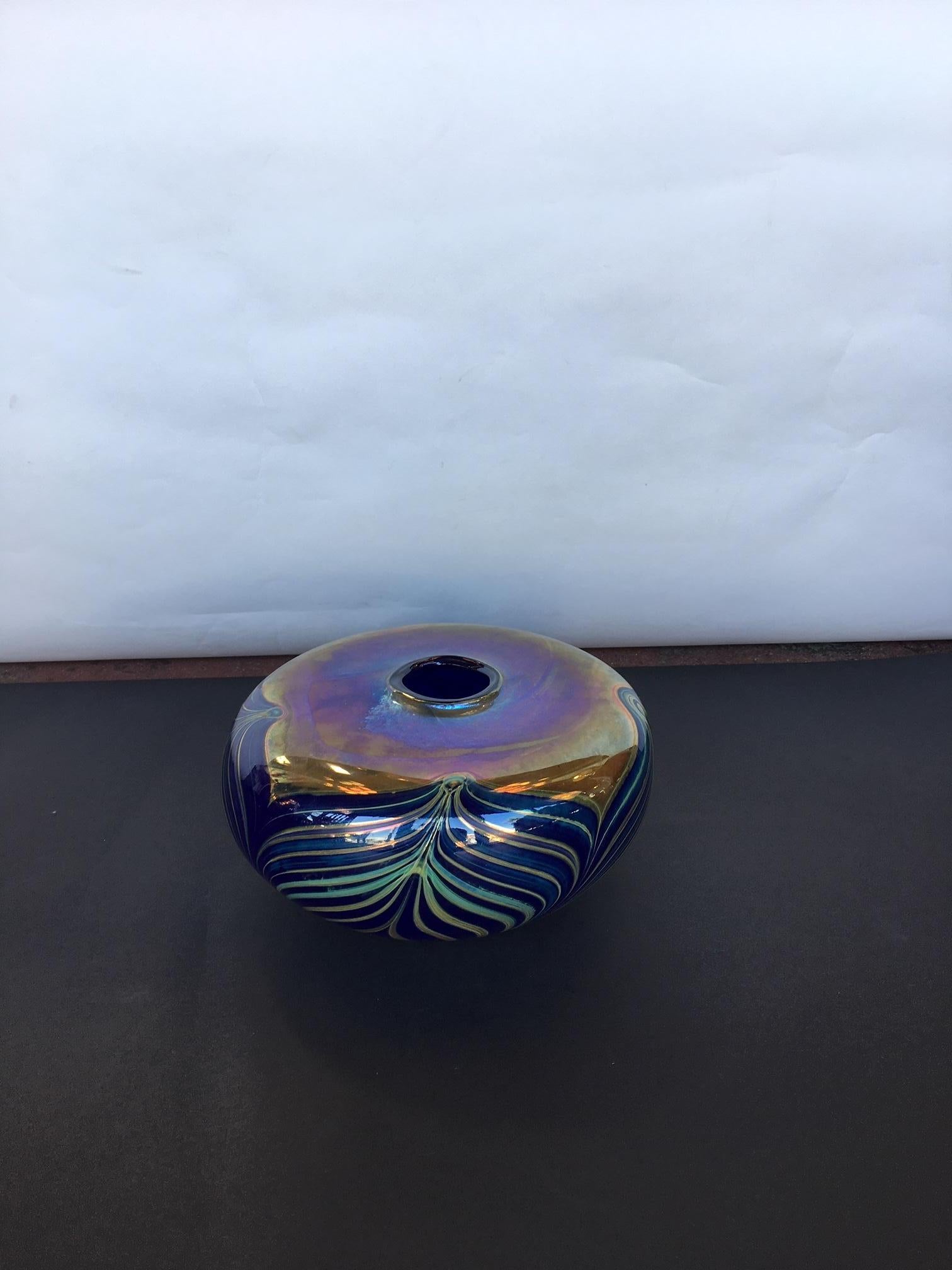 Fellerman Art Glass vase. Featuring a round form with feature detailing finished white iridescent green. Signed and Dated.