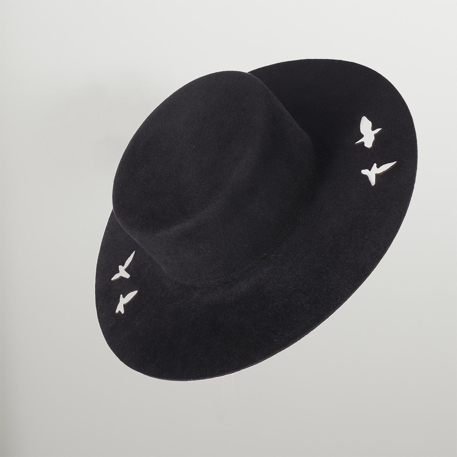 Flight Shadows Hat - pair birds 

By SVITANOK brand in collaboration with designers Dzvenyslava Zozulia and Artem Zakharchenko

DIMENSIONS
390 x 390 x 90 mm

MATERIALS
100% Felt

DESCRIPTION
This object symbolizes the dynamic movement of a static