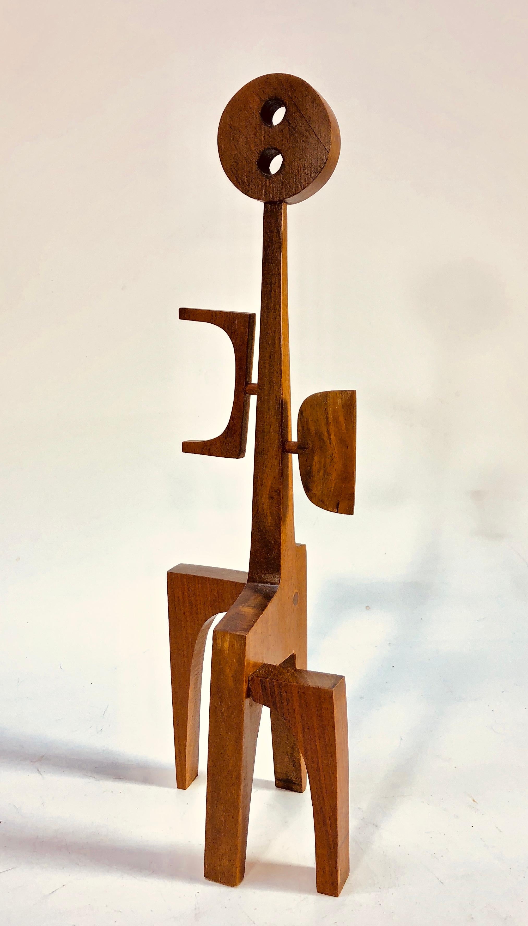 Female #3, a modernist sculpture by American artist Adam Henderson. This wonderful, totemic figure carries fertility symbols in the mid section. Signed on the back of the bottom back leg.
