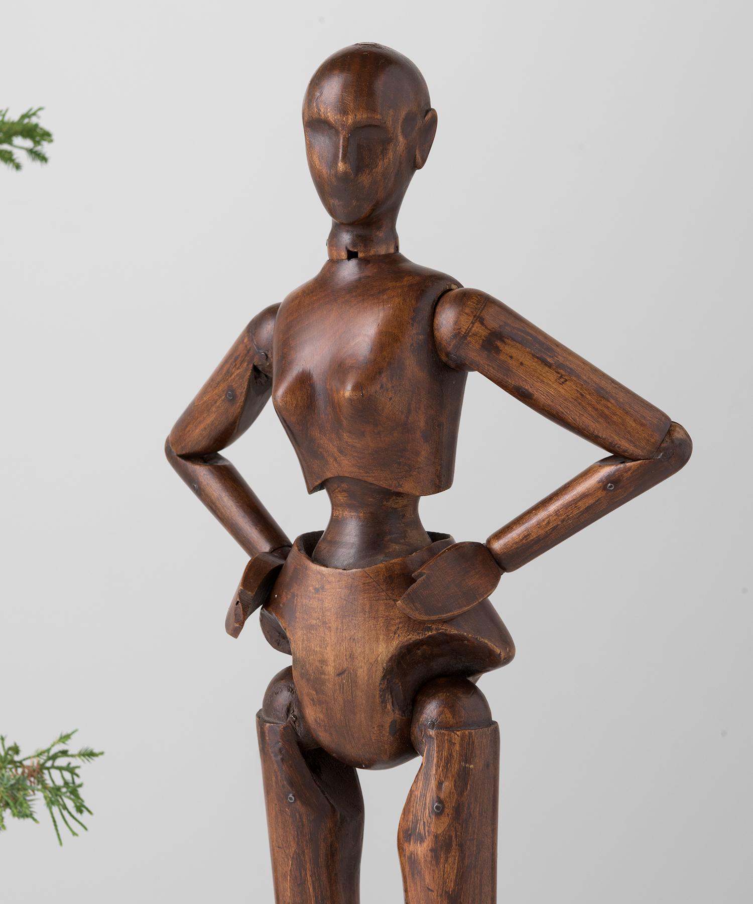 Female artist model, 19 inches tall, France, circa 1880

Carved walnut articulated female artist model, with unique features and wonderful patina.