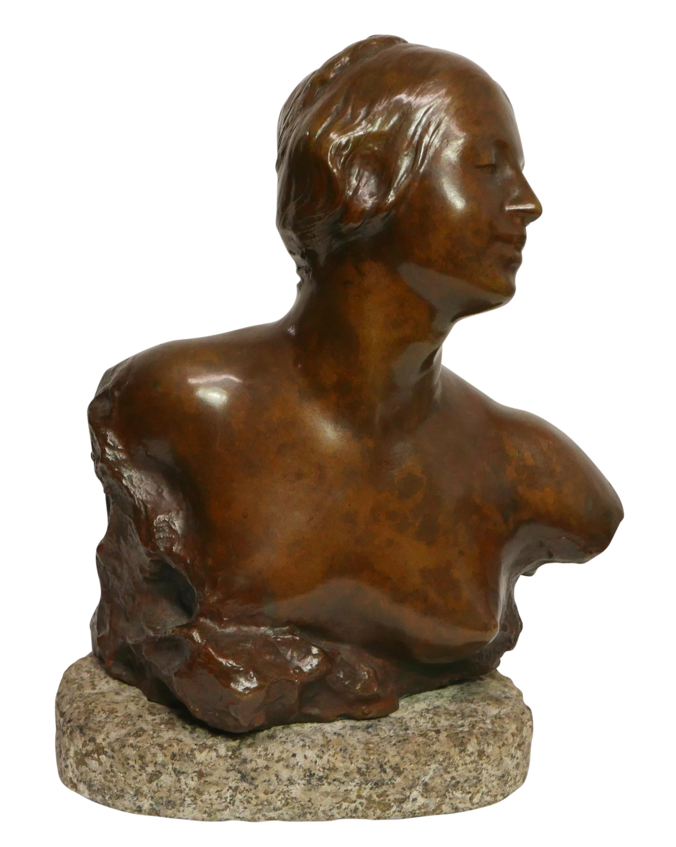 Original bronze bust of a young woman with stylized hair mounted on a coarse carved oval gray granite block. Bronze is signed lower right of her breast. 
Felix Soules (1857 - 1904) is known for Sculpture.
France, 19th Century.