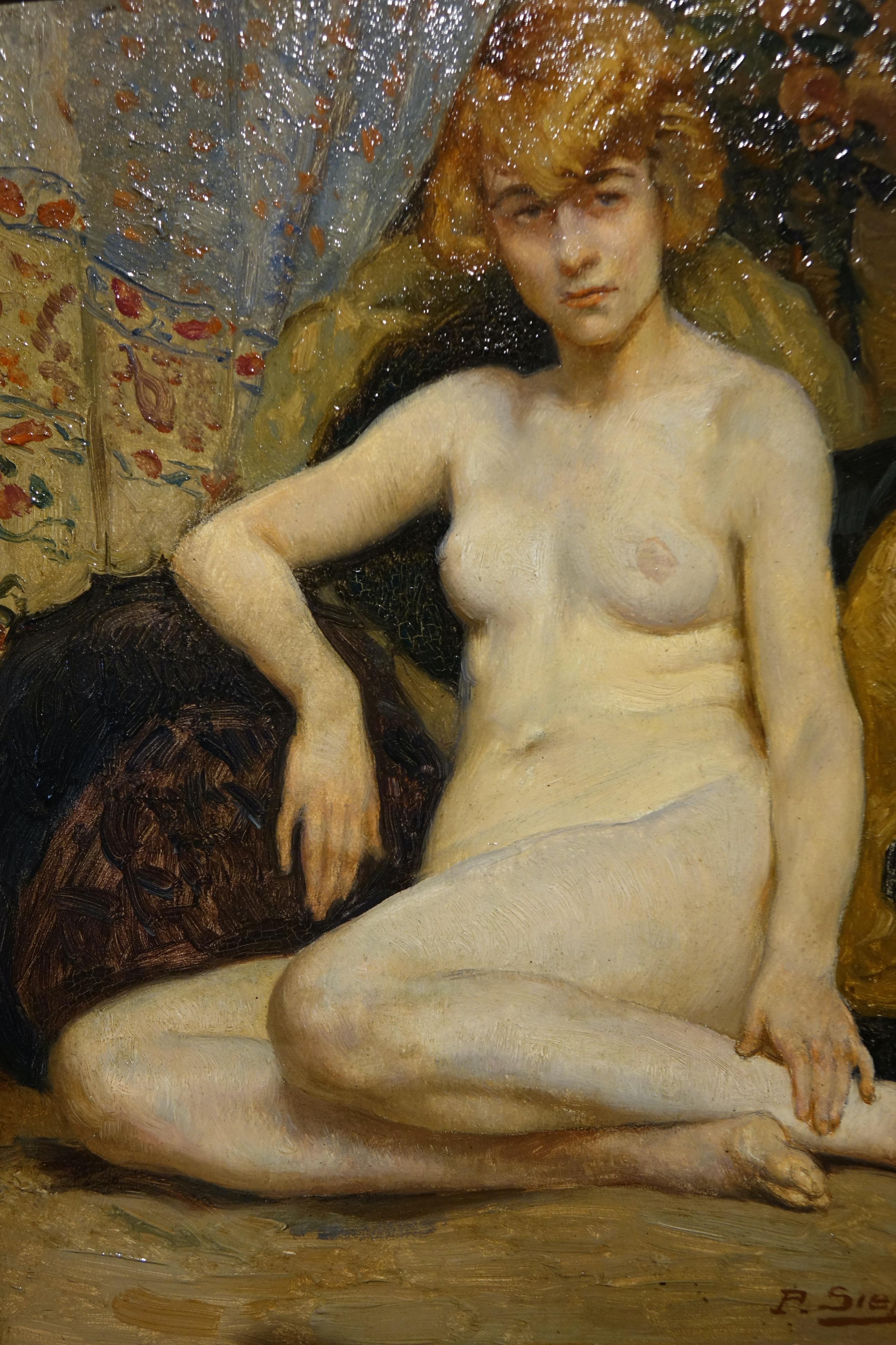 Naked young woman, probably on a bed, her legs tucked in , her right arm leaning against cushions. 
Oil on panel, signed lower right P.SIEFFERT, 1926 .
Paul SIEFFERT, French painter (1847-1957), known for his female nudes.
Paul Sieffert was the son