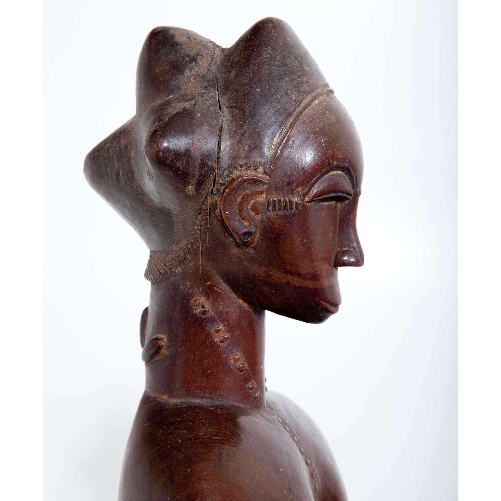 Tribal Female Sculpture of the Baule, Côte d’Ivoire, circa 1900-1920