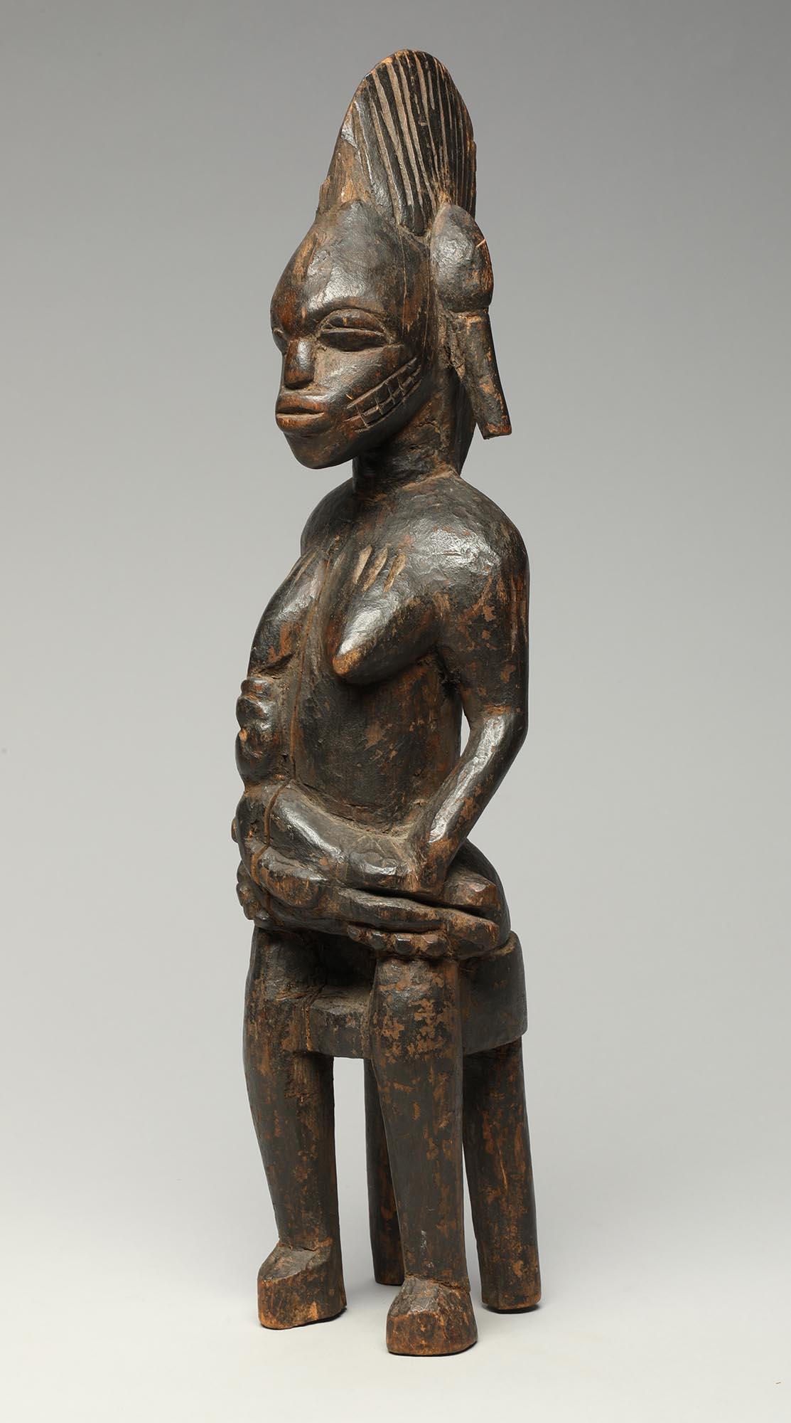 Female Senufo Wood Maternity Figure with Baby Seated on Stool nursing In Distressed Condition For Sale In Point Richmond, CA