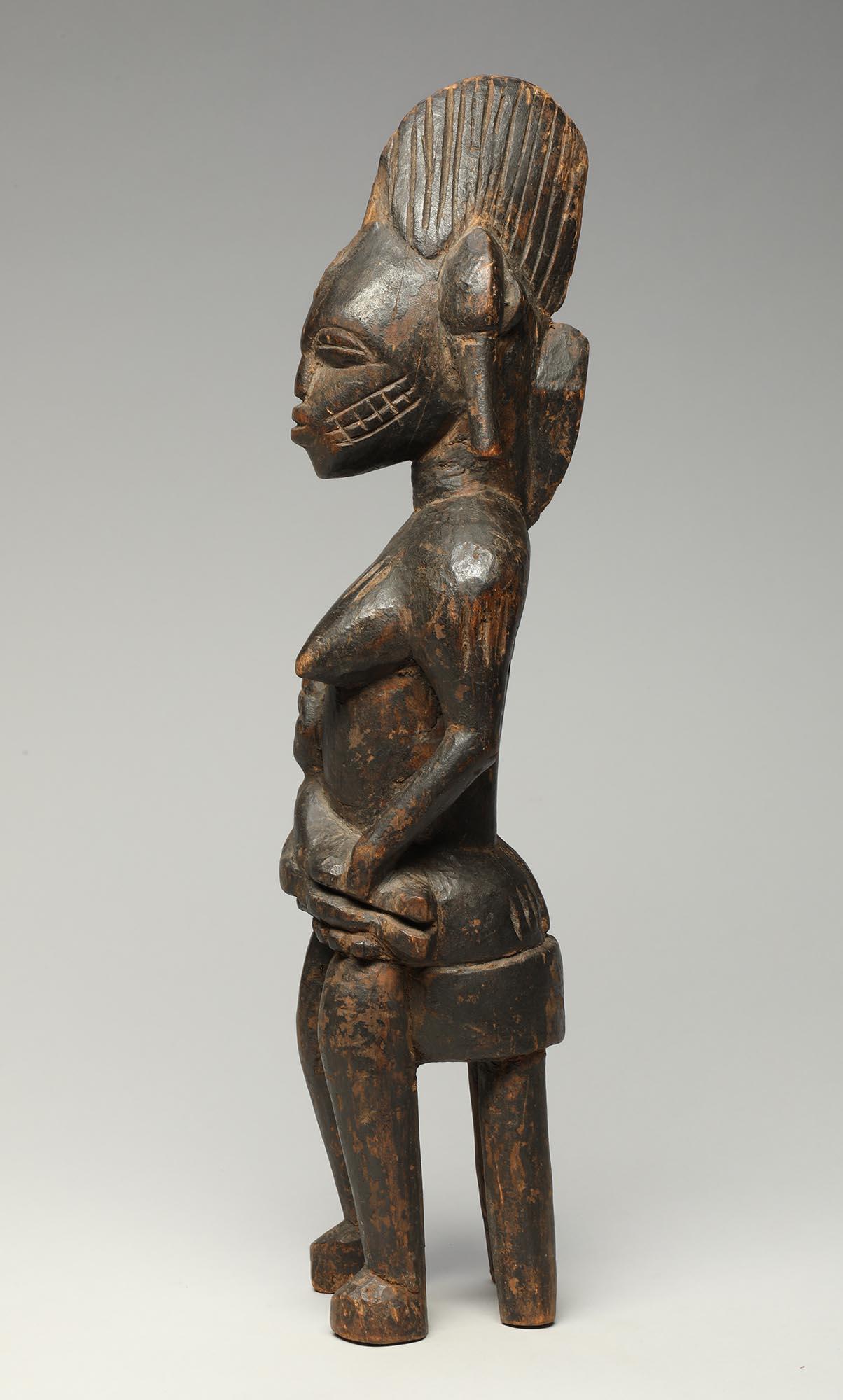 20th Century Female Senufo Wood Maternity Figure with Baby Seated on Stool nursing For Sale