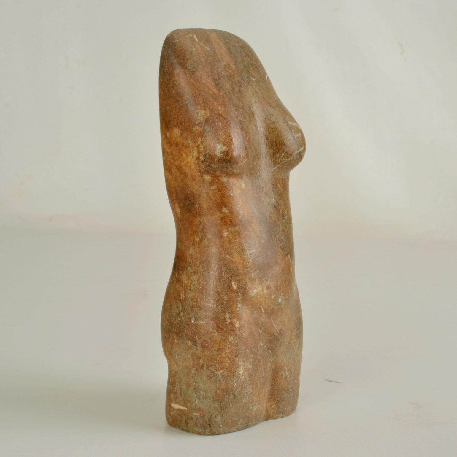 Hand carved marble female torso. 