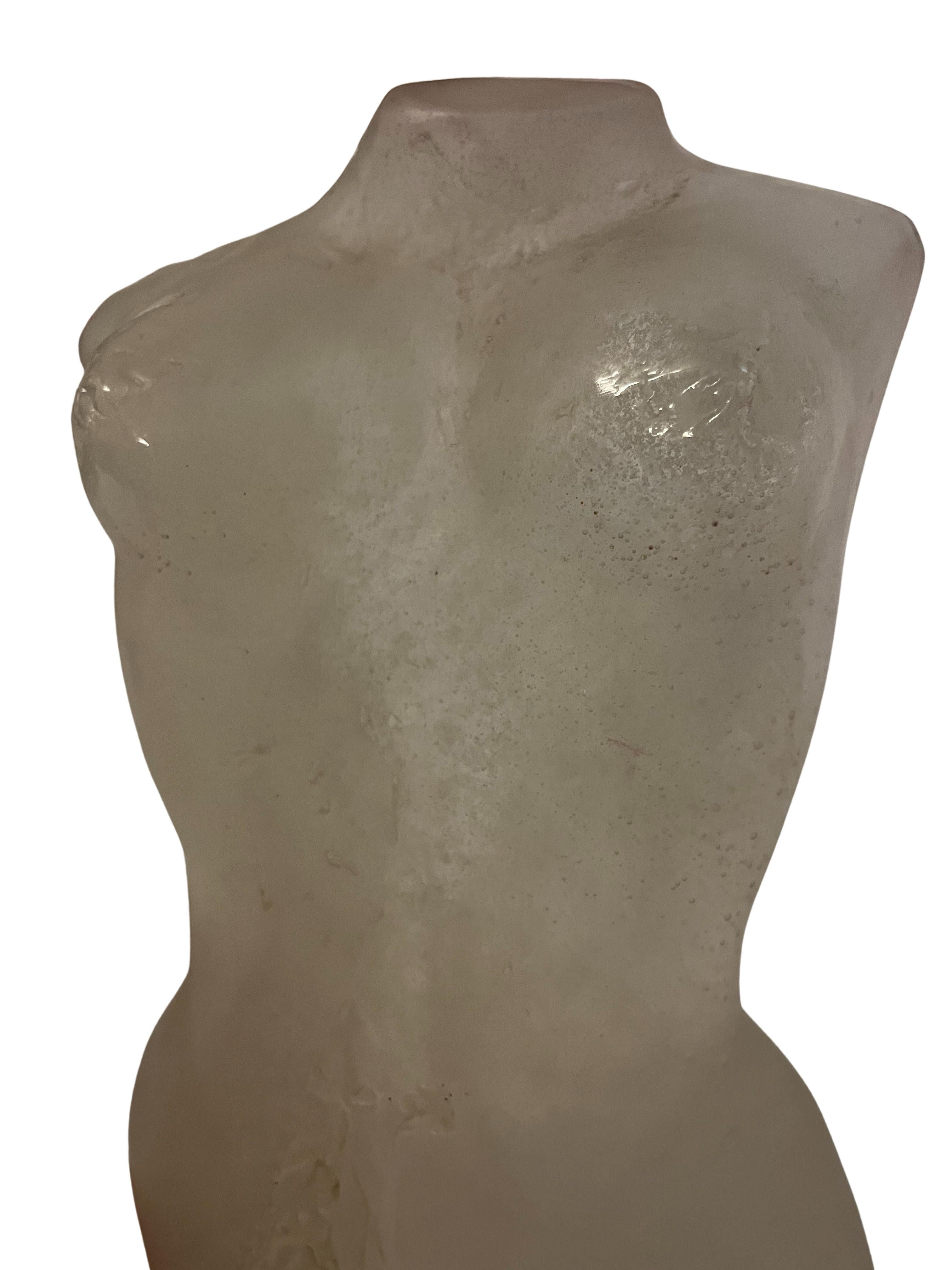 A rare woman's torso, called Eurydice, in white pat de verre, beautifully designed according to nature, by Maurice Legendre, from the well-known manufacturer Daum Nancy, France.

The object has a masterly form in a very appealing color - which fits