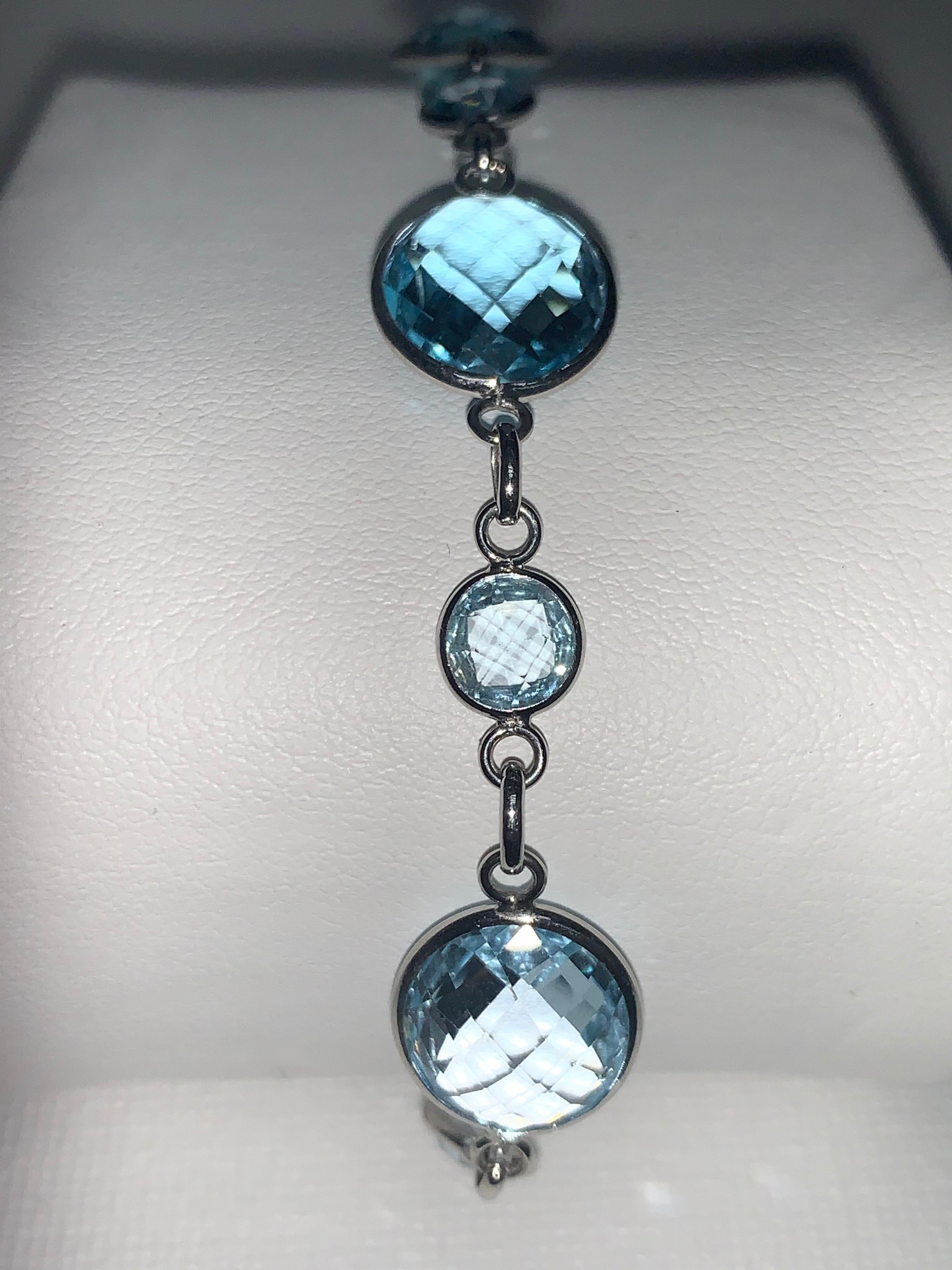 Feminine and Delicate 14 Karat White Gold Blue Topaz Handcrafted Link Bracelet. Beautiful gift for all age categories.  Whomever she is, she will love to receive and wear this beautiful bracelet.
14 Karat White Gold
Blue Topaz
Hand